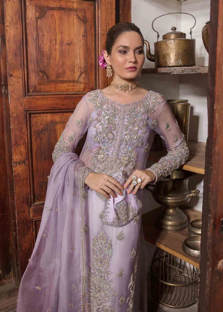 Model in Kanwal Malik Angana '23 Jamani dress, epitomizing Pakistani wedding attire online in the UK.