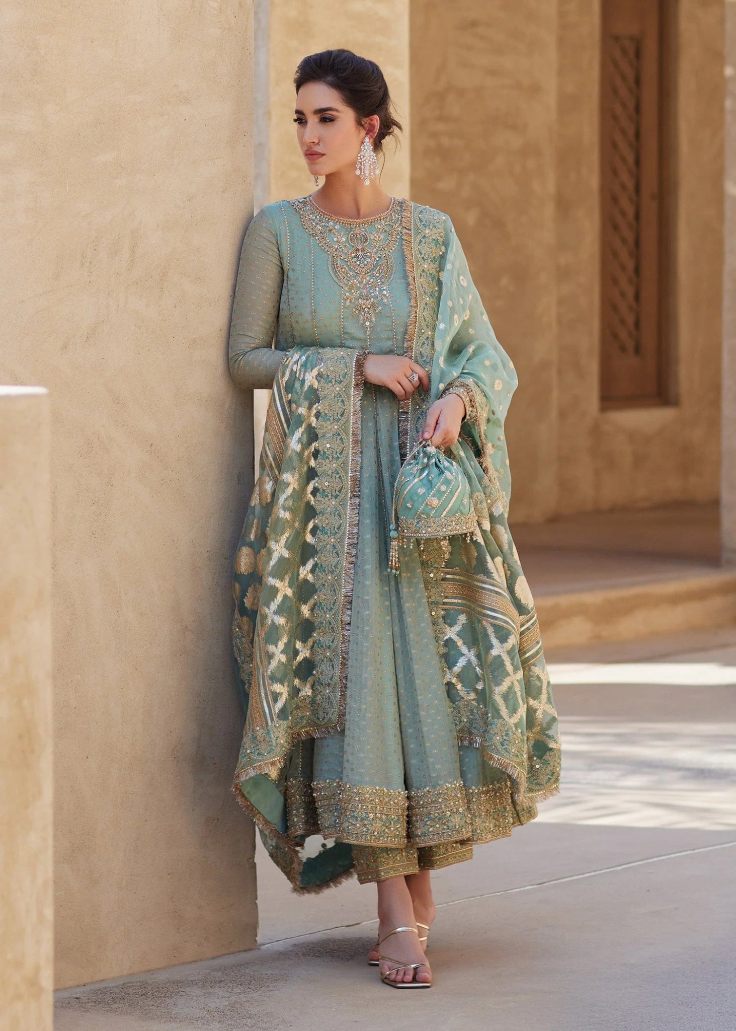 Model wearing Mist from Kanwal Malik's Laira '24 collection, a luxurious and elegant design. Pakistani clothes online in UK.