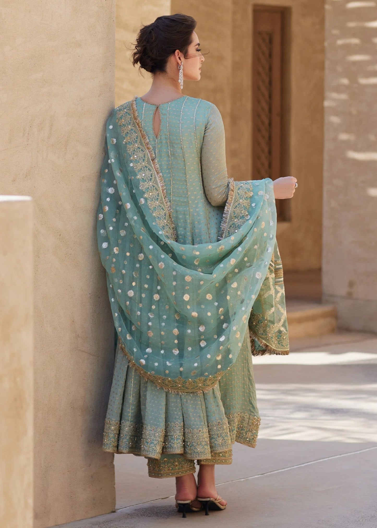 Model wearing Mist from Kanwal Malik's Laira '24 collection, a luxurious and elegant design. Pakistani clothes online in UK.