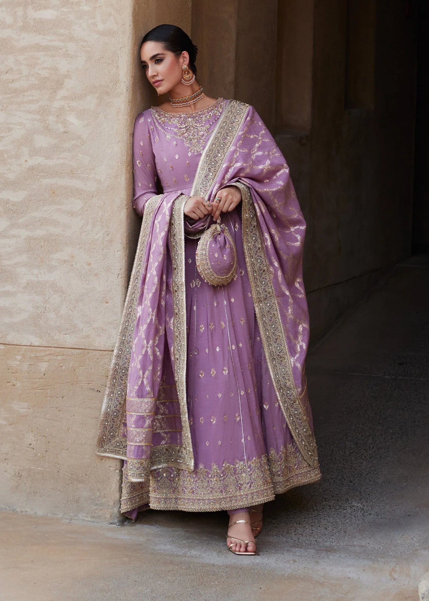 Model wearing Vaneeza from Kanwal Malik's Laira '24, featuring luxurious design. Pakistani clothes online in UK.