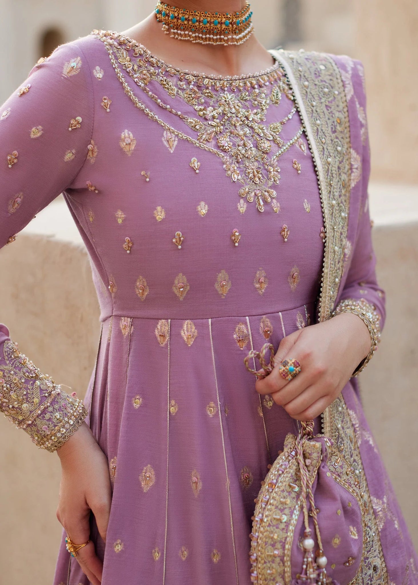Model wearing Vaneeza from Kanwal Malik's Laira '24, featuring luxurious design. Pakistani clothes online in UK.