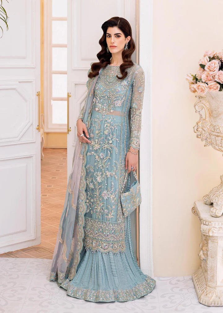 Model wearing Kanwal Malik MIRHA II '23 RIMEL dress, showcasing Pakistani wedding attire online in the UK.