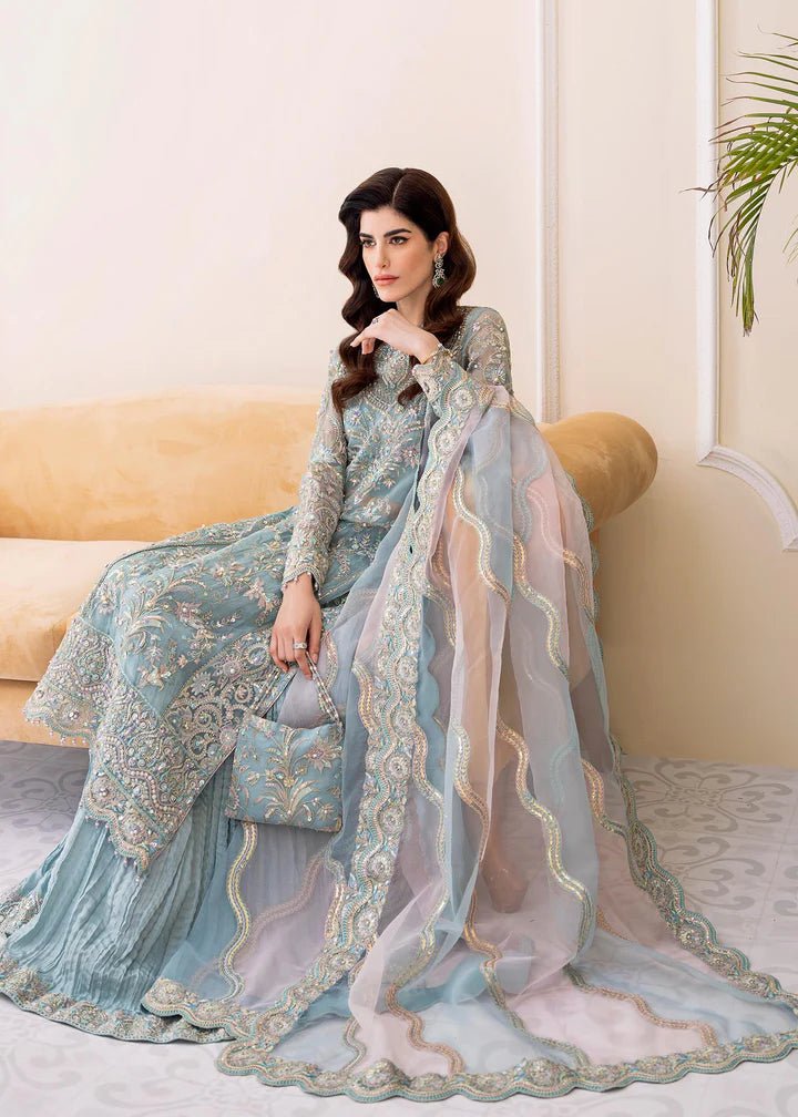Model wearing Kanwal Malik MIRHA II '23 RIMEL dress, showcasing Pakistani wedding attire online in the UK.