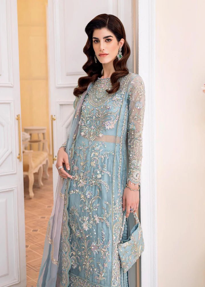 Model wearing Kanwal Malik MIRHA II '23 RIMEL dress, showcasing Pakistani wedding attire online in the UK.
