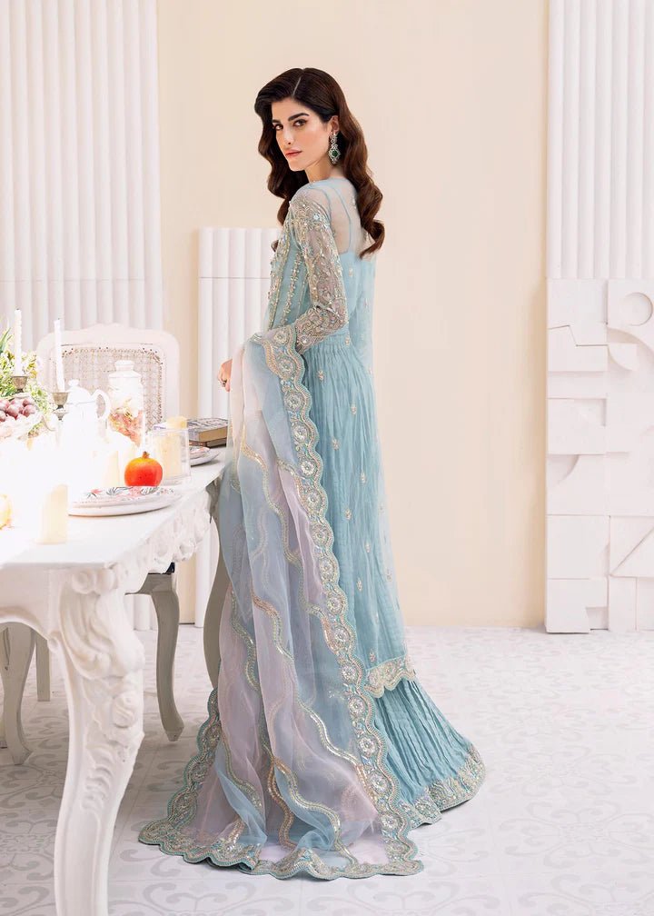 Model wearing Kanwal Malik MIRHA II '23 RIMEL dress, showcasing Pakistani wedding attire online in the UK.