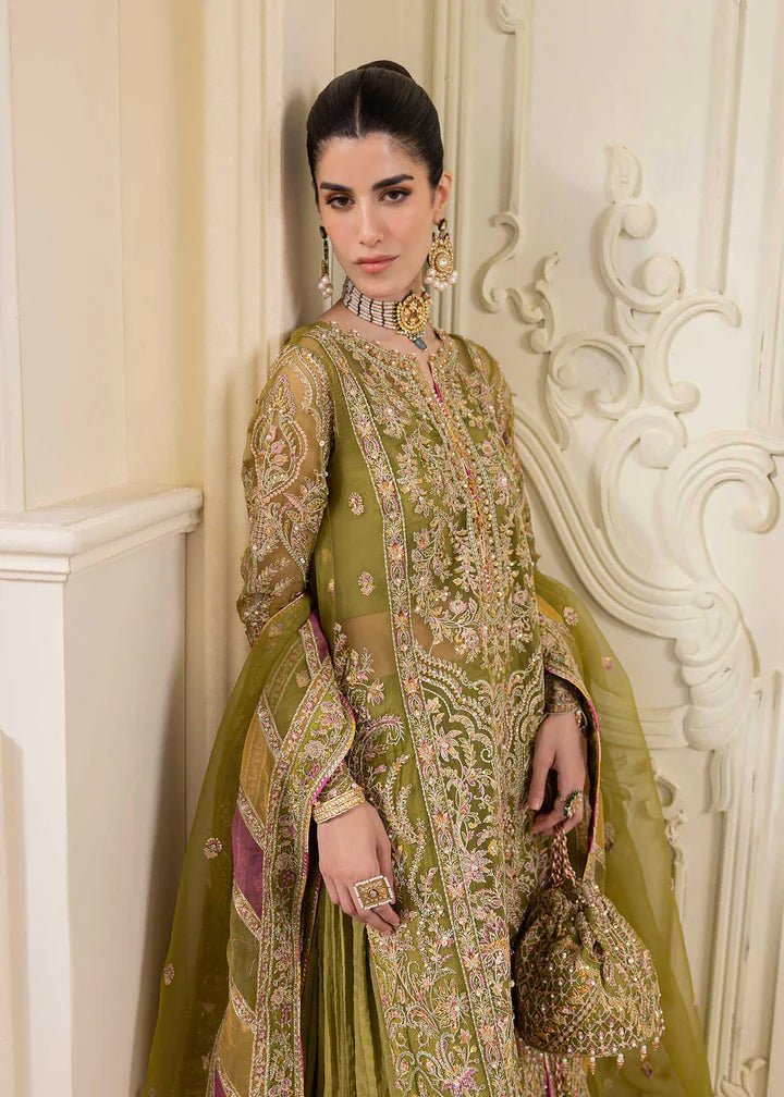 Model in Kanwal Malik MIRHA III Eid 24 Halena dress, enhancing Pakistani clothes online in the UK.