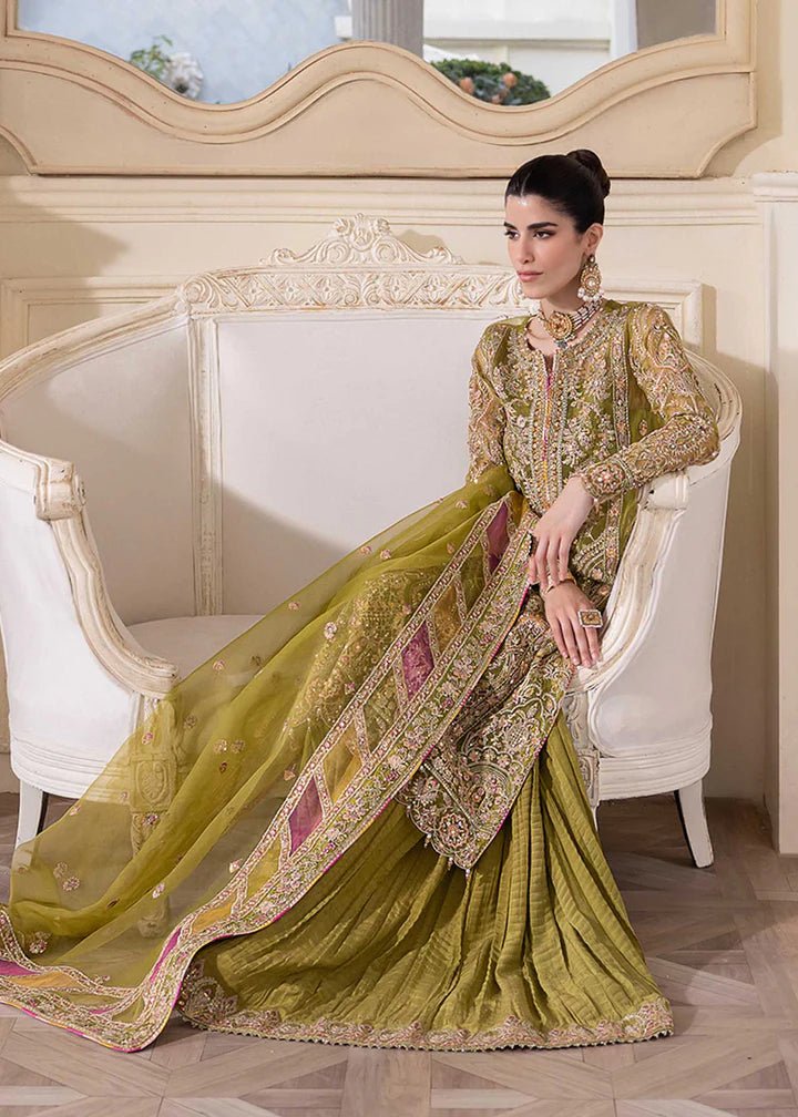 Model in Kanwal Malik MIRHA III Eid 24 Halena dress, enhancing Pakistani clothes online in the UK.