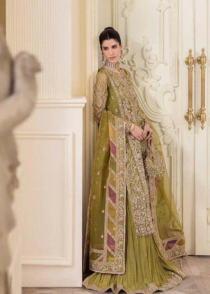 Model in Kanwal Malik MIRHA III Eid 24 Halena dress, enhancing Pakistani clothes online in the UK.