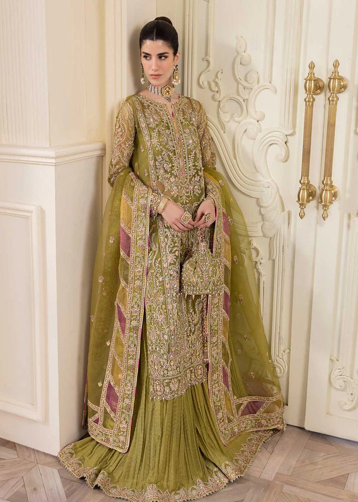 Model in Kanwal Malik MIRHA III Eid 24 Halena dress, enhancing Pakistani clothes online in the UK.