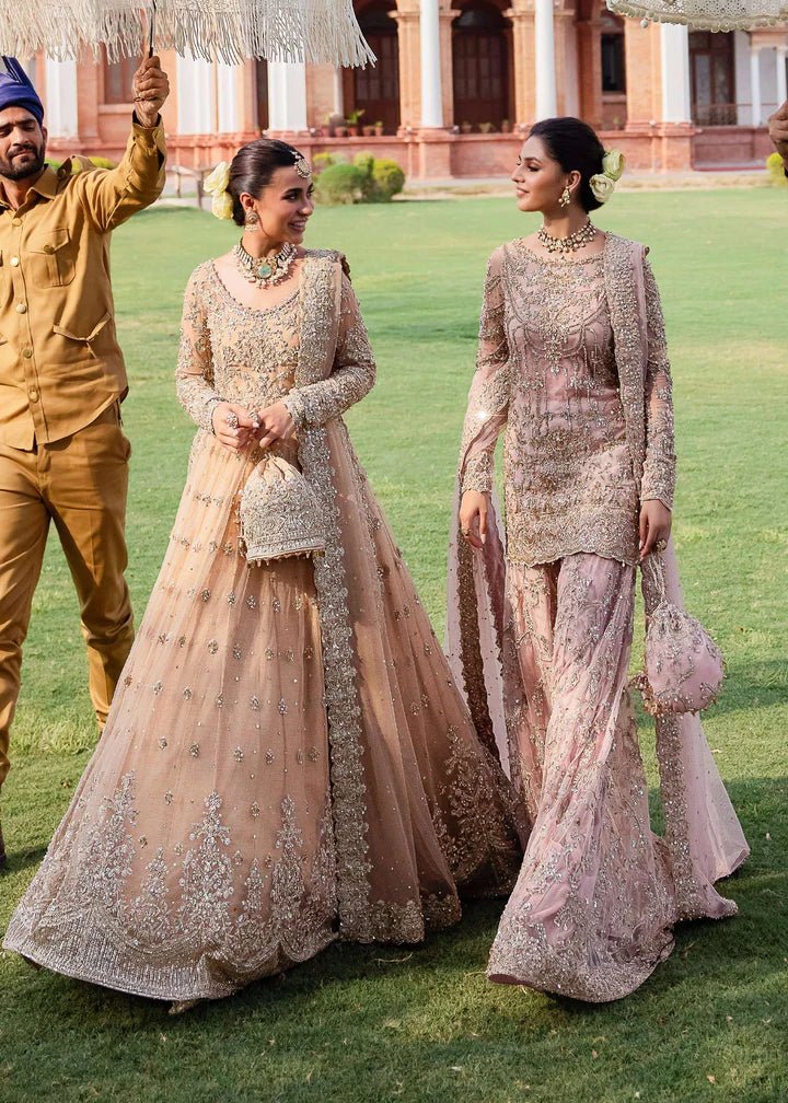 Model wearing Kanwal Malik Raaniyan Luxury Formals Jasmine dress in gold, Pakistani bridal clothes online in UK.