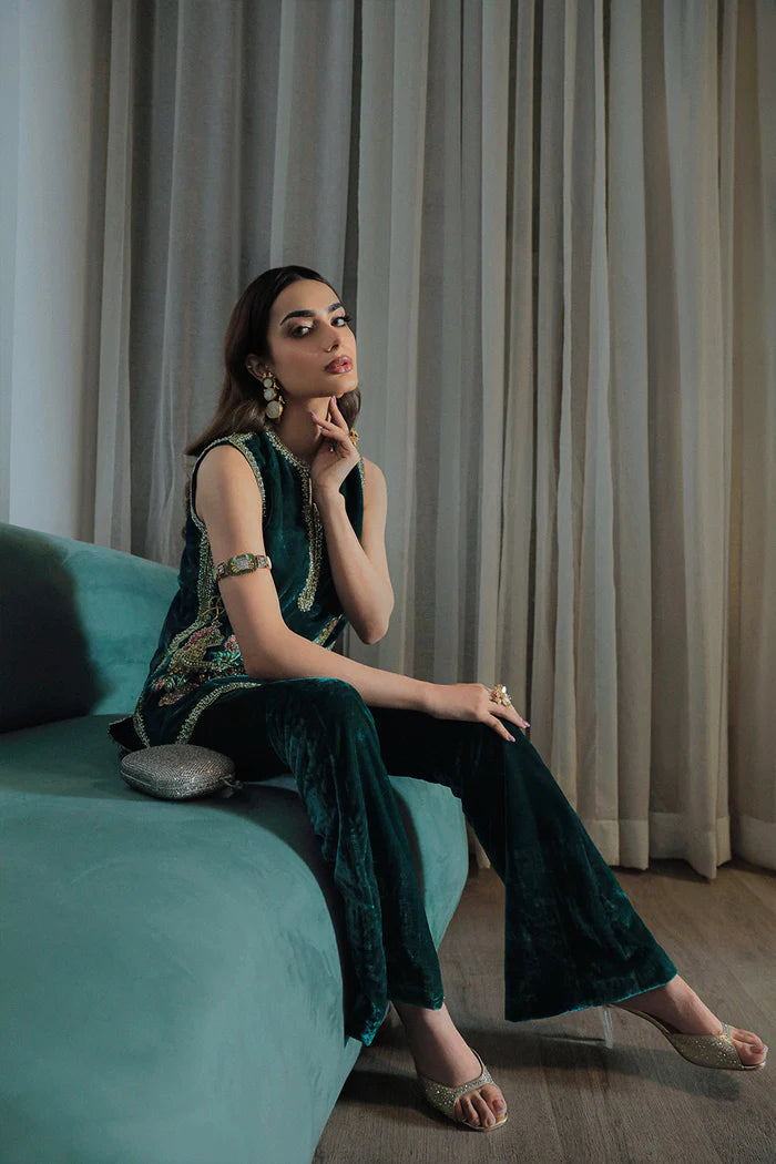 Model in emerald Simone dress from Saira Rizwan Luxury Pret Riona '23, an icon of Pakistani chic in the UK.
