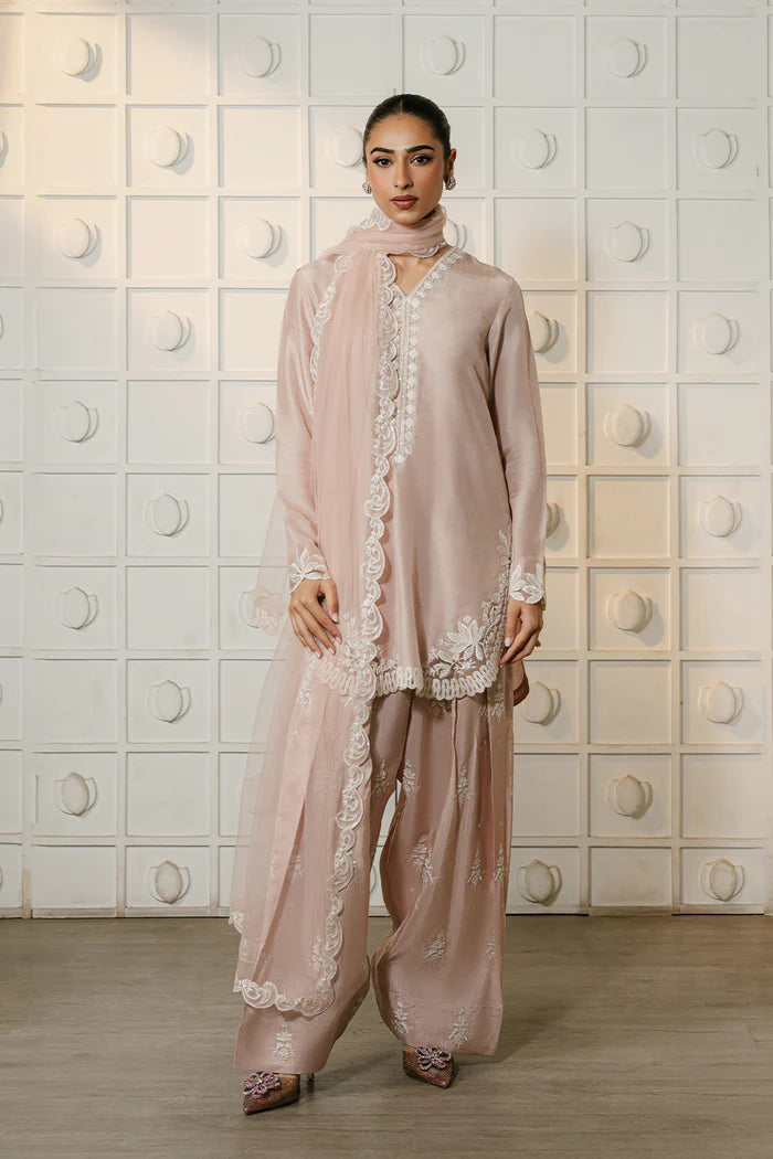 Model wearing blush pink NORA-SREP1-04 from Saira Rizwan Luxury Lawn Eid Edit '25, perfect for Pakistani luxury pret and online shopping in UK.