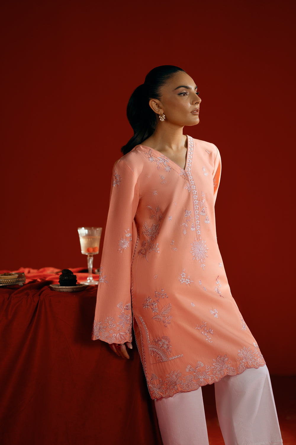 Model wearing peach embroidered outfit from Saira Rizwan Joolie | PEACH - JBP25-05, elegant Pakistani luxury pret available online in UK.