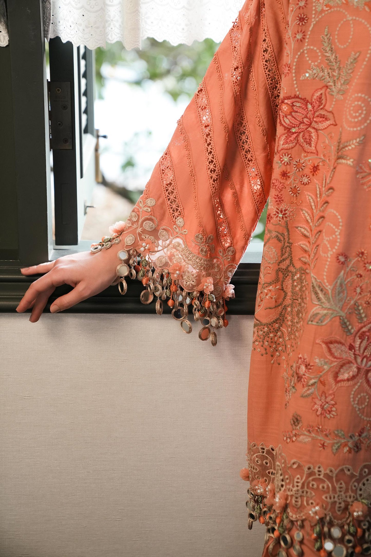 Model wearing peach embroidered dress with multicolour printed dupatta from Sana Safinaz Luxury Lawn '25, Pakistani clothes online in UK.