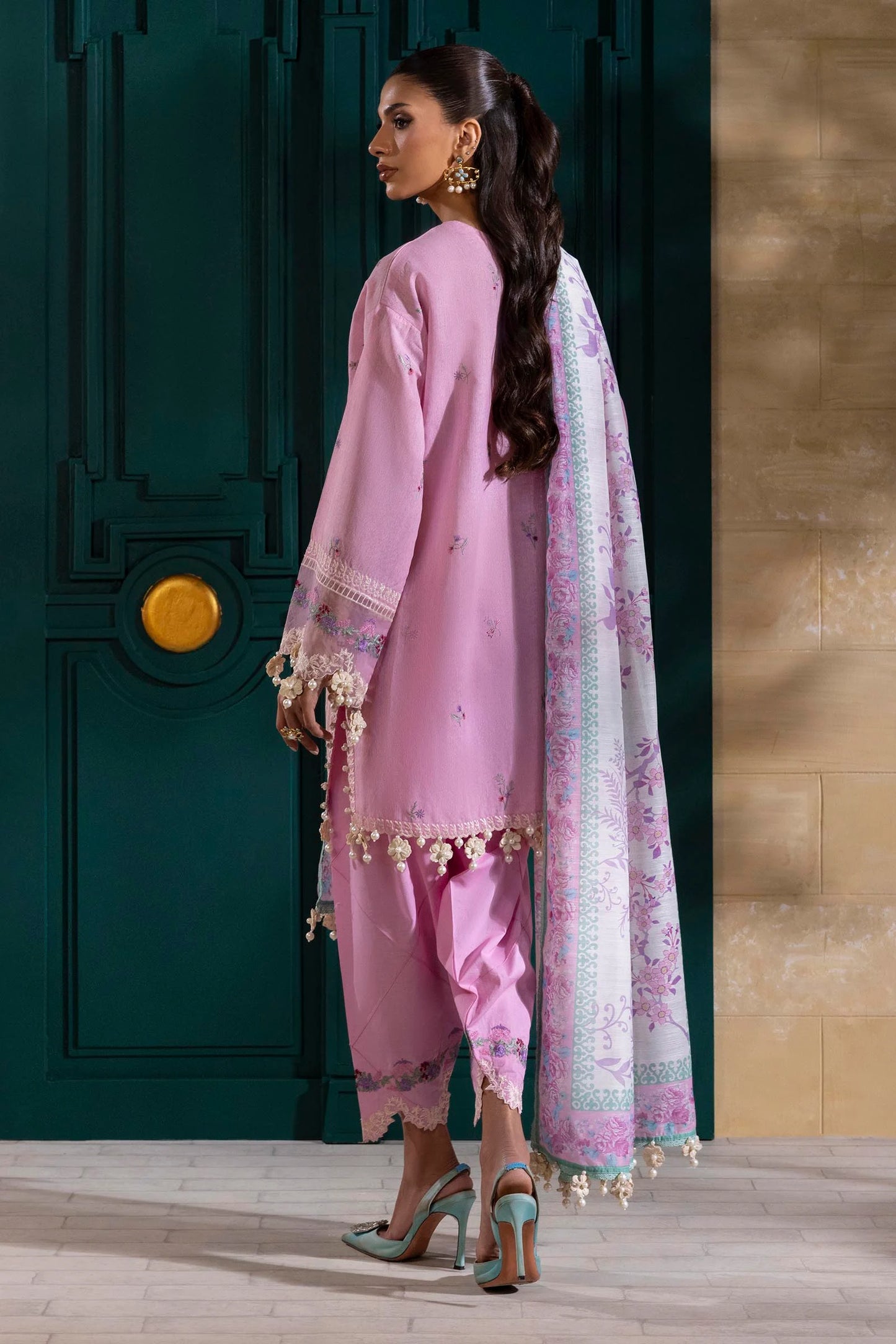Model wearing pastel pink embroidered outfit with floral printed dupatta from Sana Safinaz Muzlin Spring '25, Pakistani Luxury pret UK.