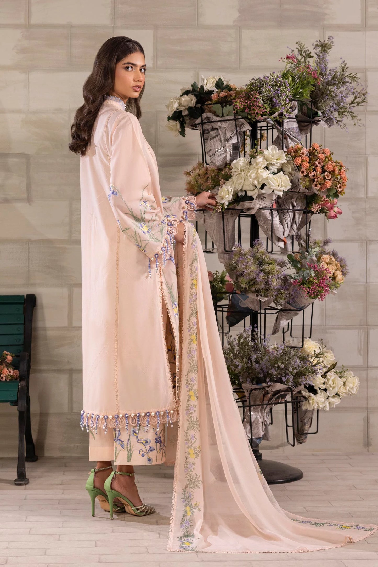 Model wearing peach Sana Safinaz M251-017B-3CJ outfit with blue floral embroidery and matching dupatta, Pakistani Luxury pret in UK.