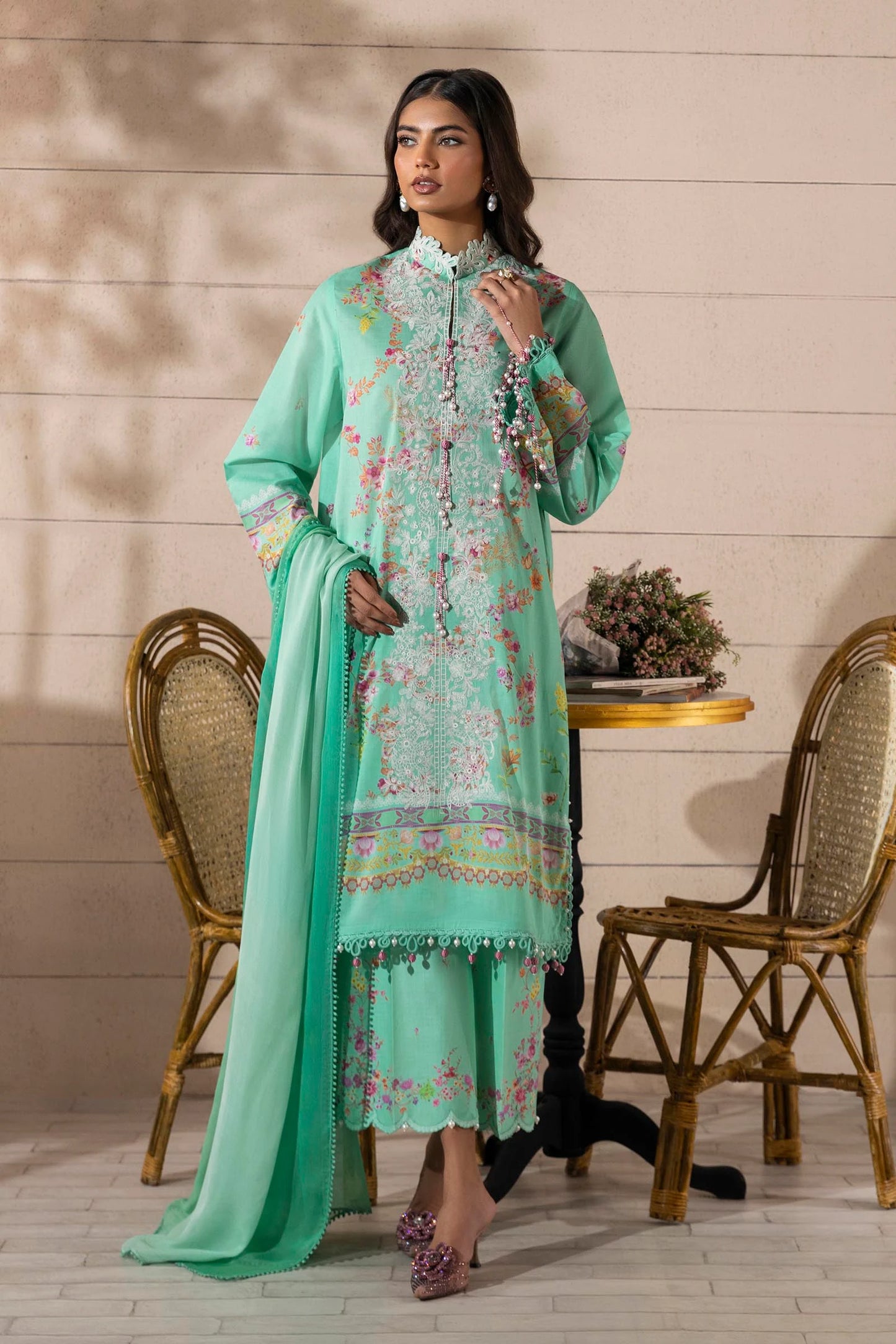 Model wearing mint green Sana Safinaz M251-023B-3CI outfit with delicate white embroidery and floral print, Pakistani Luxury pret, Pakistani clothes online in UK.