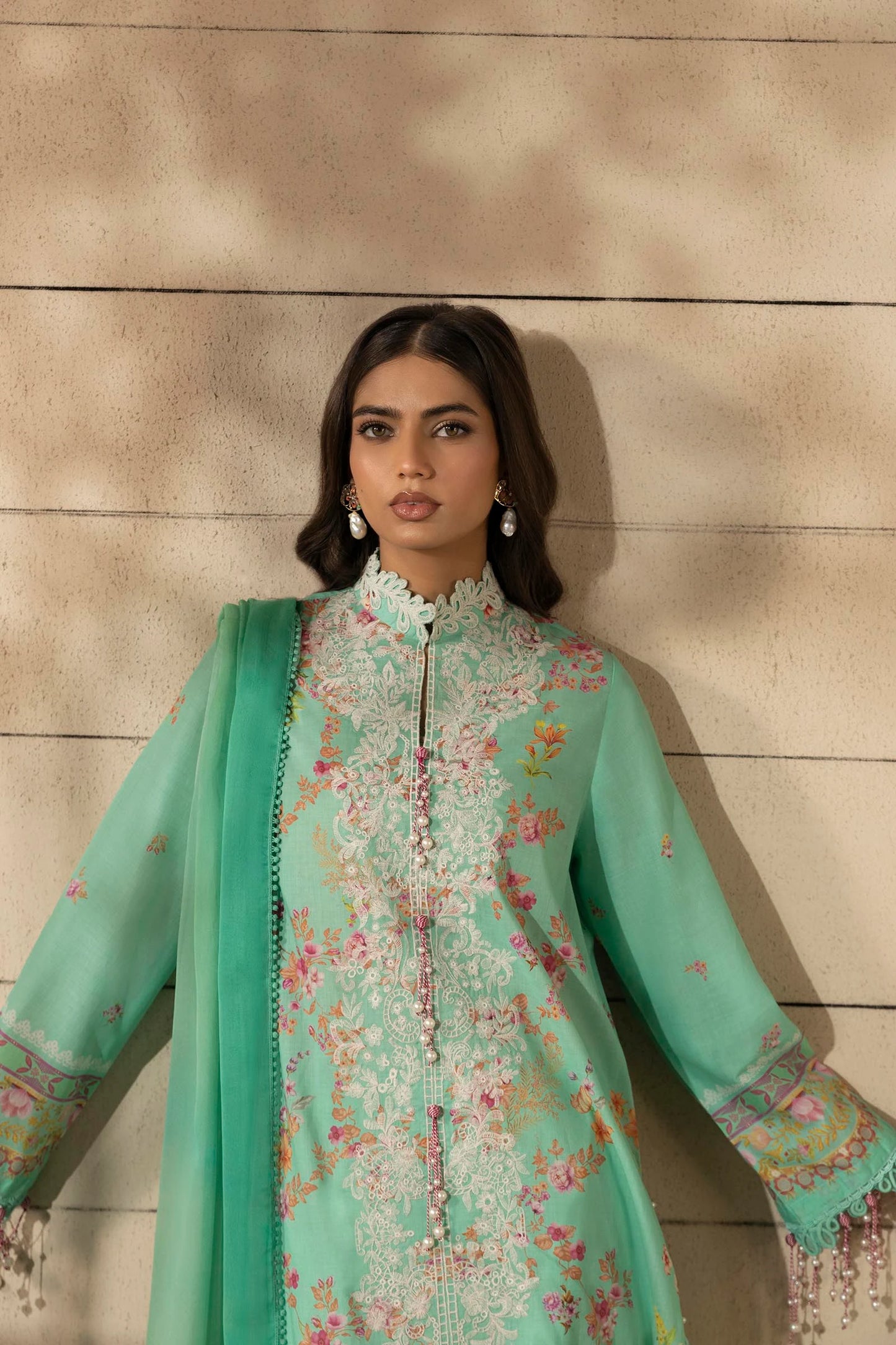 Model wearing mint green Sana Safinaz M251-023B-3CI outfit with delicate white embroidery and floral print, Pakistani Luxury pret, Pakistani clothes online in UK.