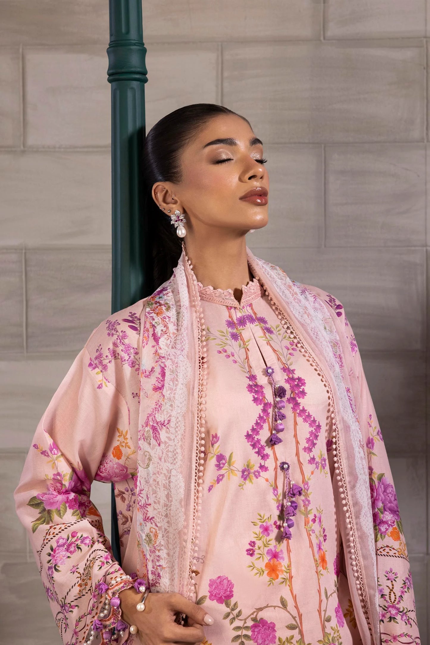 Model wearing blush pink Sana Safinaz M251-026B-3CI outfit with vibrant floral embroidery and matching dupatta, Pakistani Luxury pret, Pakistani clothes online in UK.
