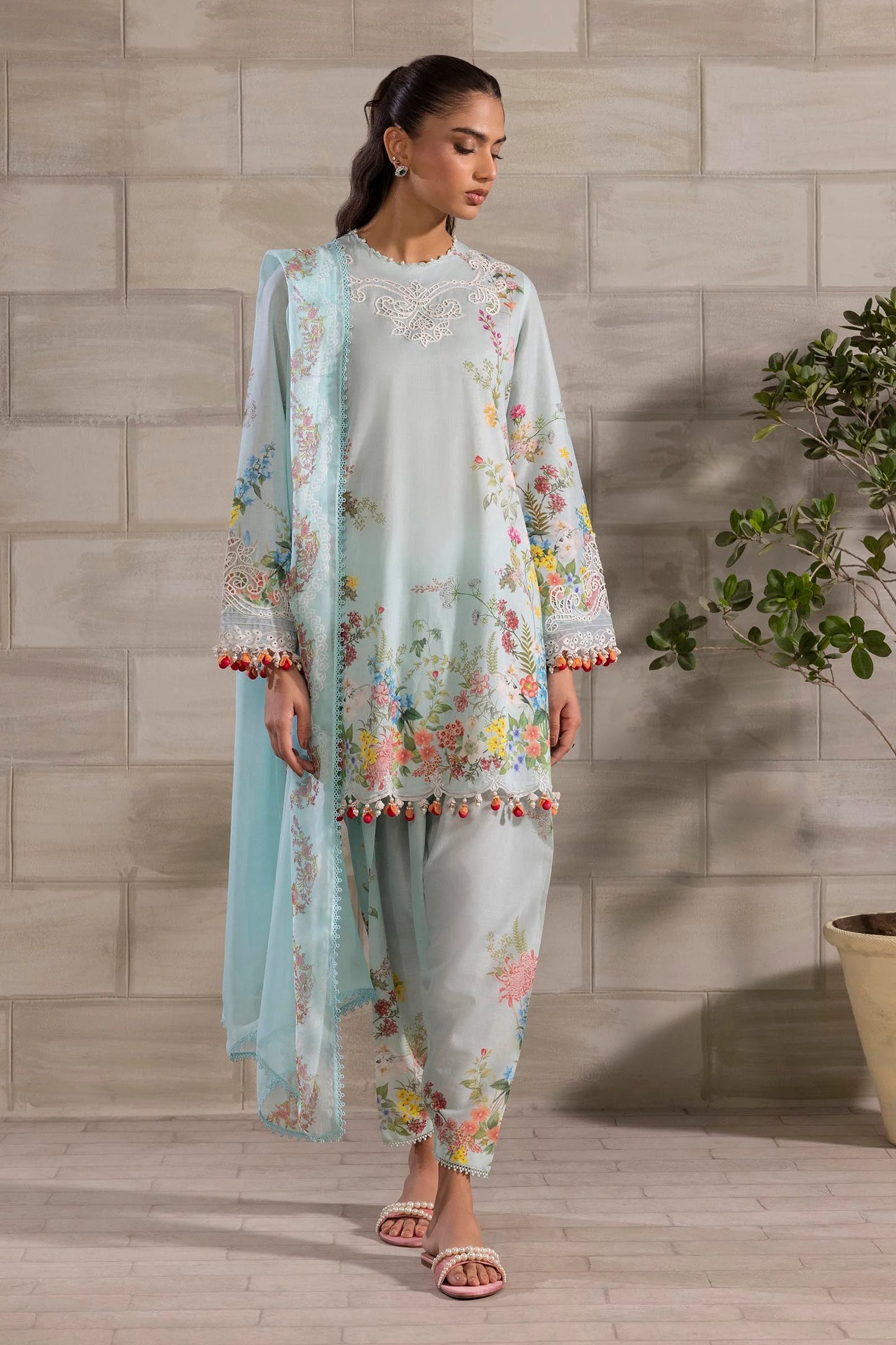 Model wearing pastel blue Sana Safinaz M251-030A-3CI outfit with multicolor floral prints and lace detailing, Pakistani Luxury pret, Pakistani clothes online in UK.