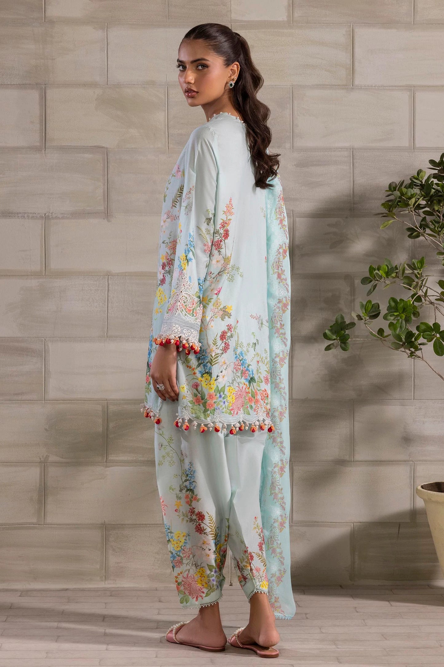 Model wearing pastel blue Sana Safinaz M251-030A-3CI outfit with multicolor floral prints and lace detailing, Pakistani Luxury pret, Pakistani clothes online in UK.