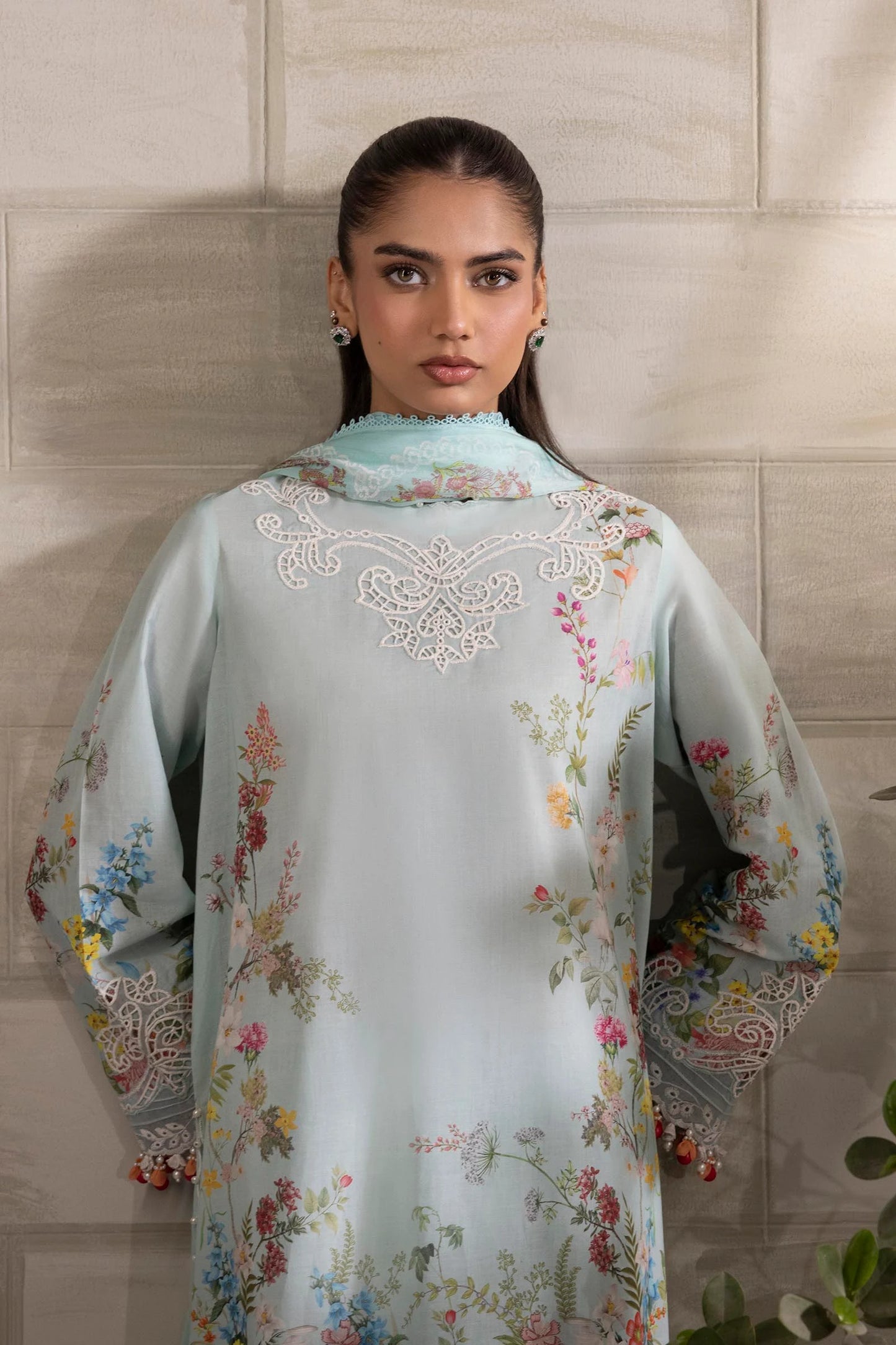 Model wearing pastel blue Sana Safinaz M251-030A-3CI outfit with multicolor floral prints and lace detailing, Pakistani Luxury pret, Pakistani clothes online in UK.
