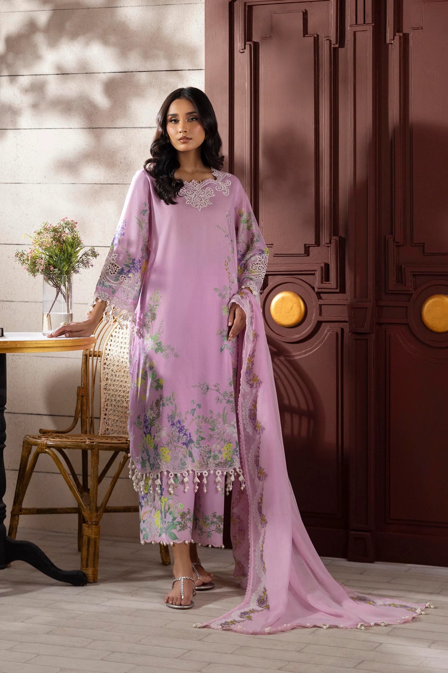 Model wearing lilac pink Sana Safinaz M251-030B-3CI outfit with pastel floral prints and lace detailing, Pakistani Luxury pret, Pakistani clothes online in UK.