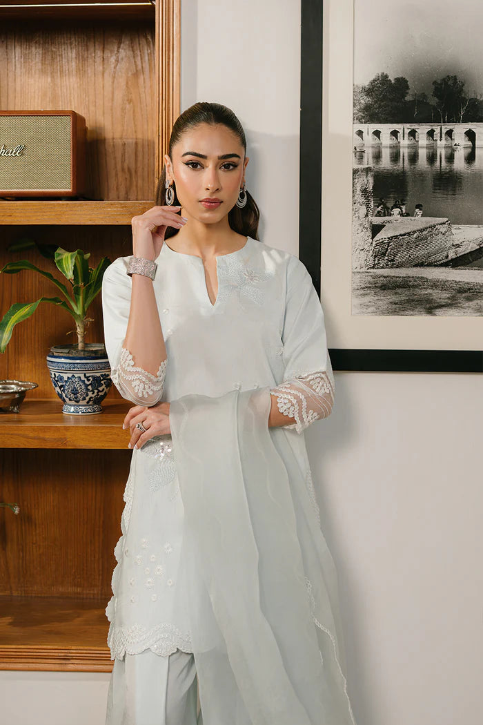 Model wearing ice blue AYRA-SREP1-03 from Saira Rizwan Luxury Lawn Eid Edit '25, ideal for Pakistani luxury pret and clothes online in UK.