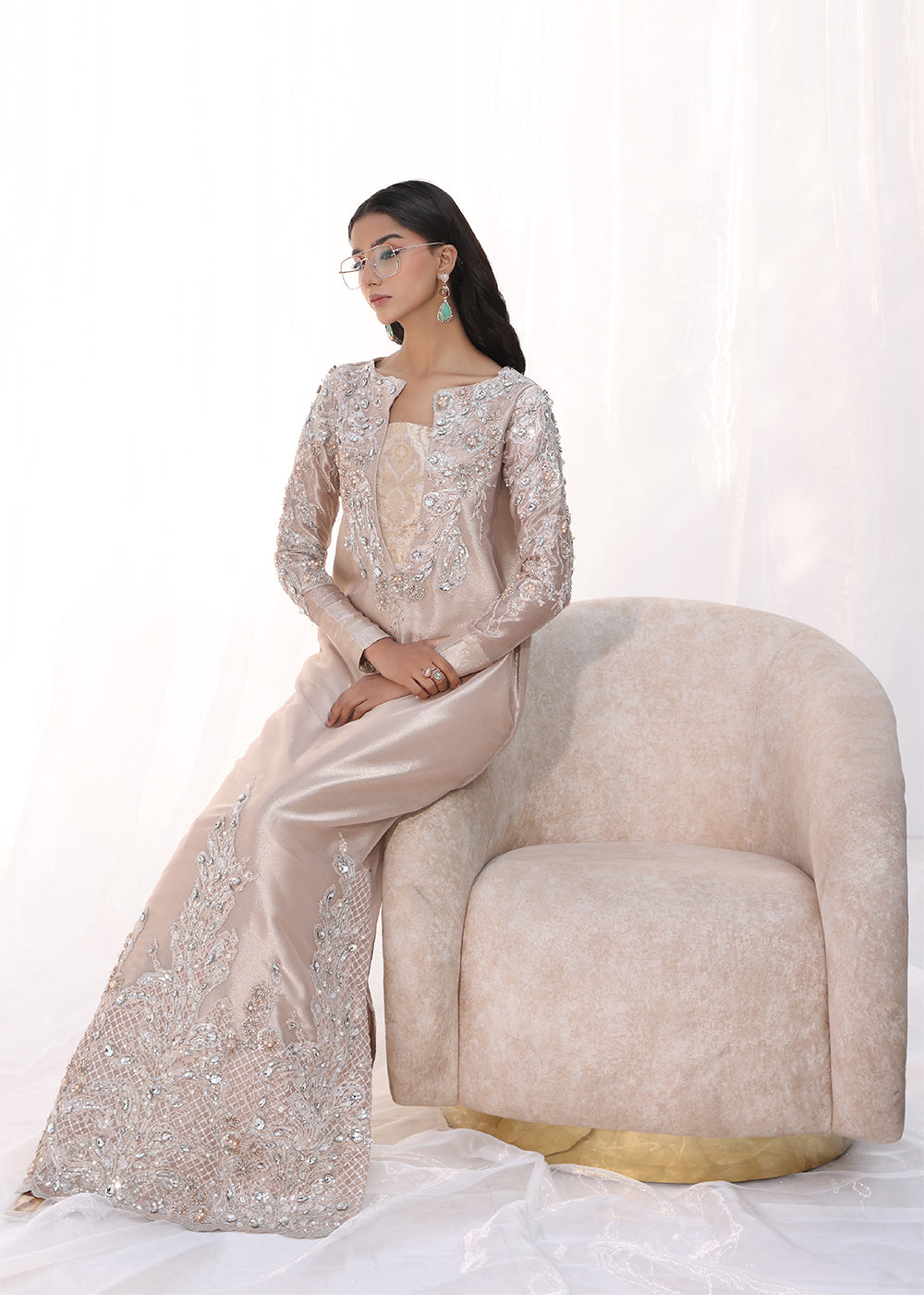 Model wearing blush pink embellished long dress from Musferah Saad Moonlit Rose, Pakistani Luxury pret, Pakistani clothes online in UK.