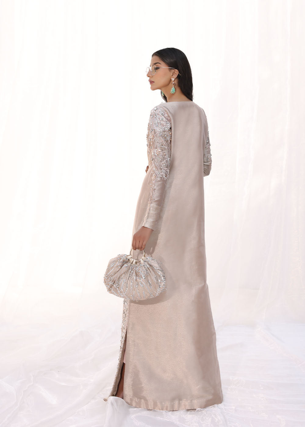 Model wearing blush pink embellished long dress from Musferah Saad Moonlit Rose, Pakistani Luxury pret, Pakistani clothes online in UK.