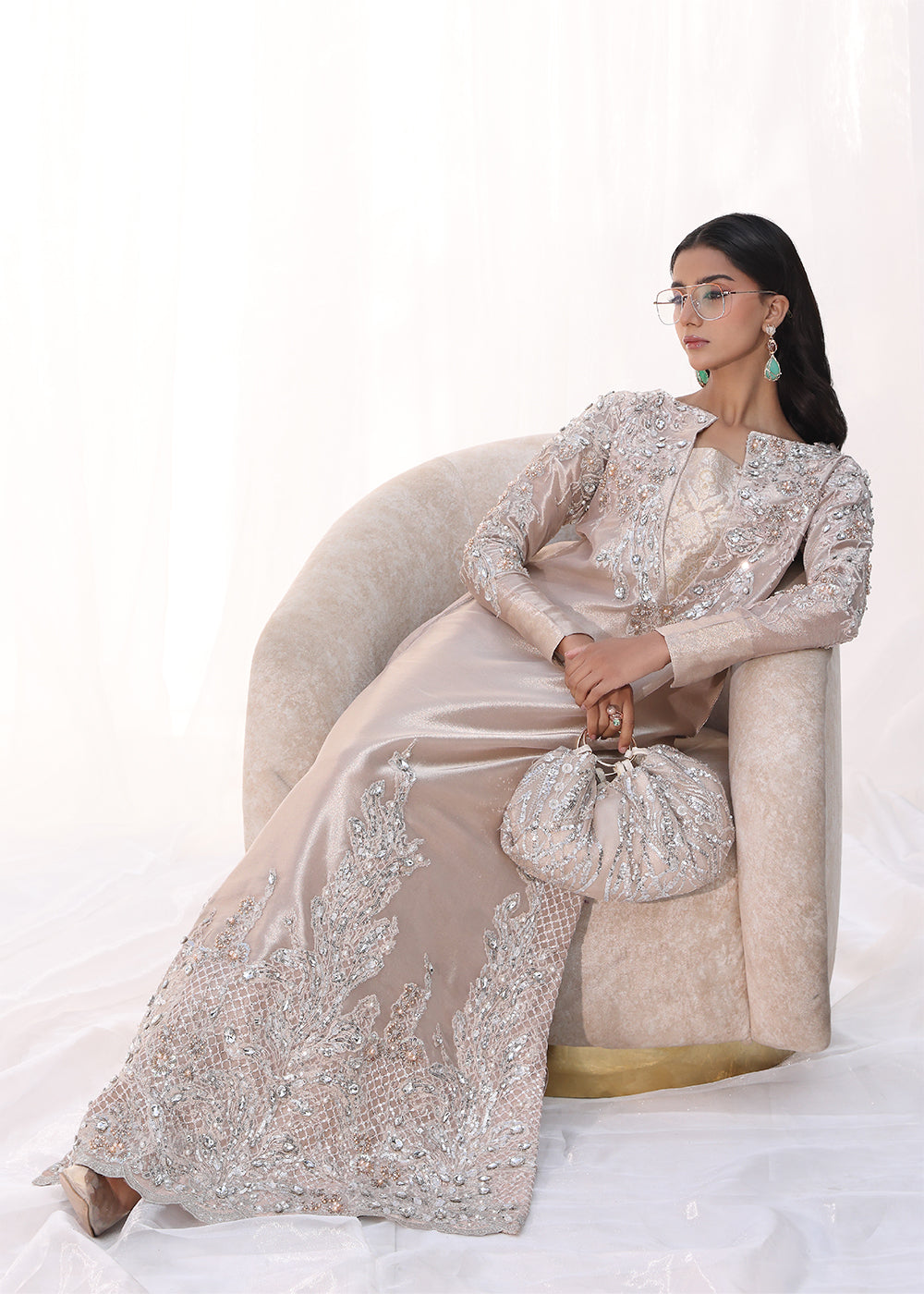 Model wearing blush pink embellished long dress from Musferah Saad Moonlit Rose, Pakistani Luxury pret, Pakistani clothes online in UK.