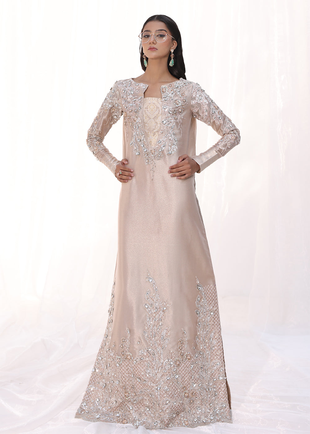 Model wearing blush pink embellished long dress from Musferah Saad Moonlit Rose, Pakistani Luxury pret, Pakistani clothes online in UK.