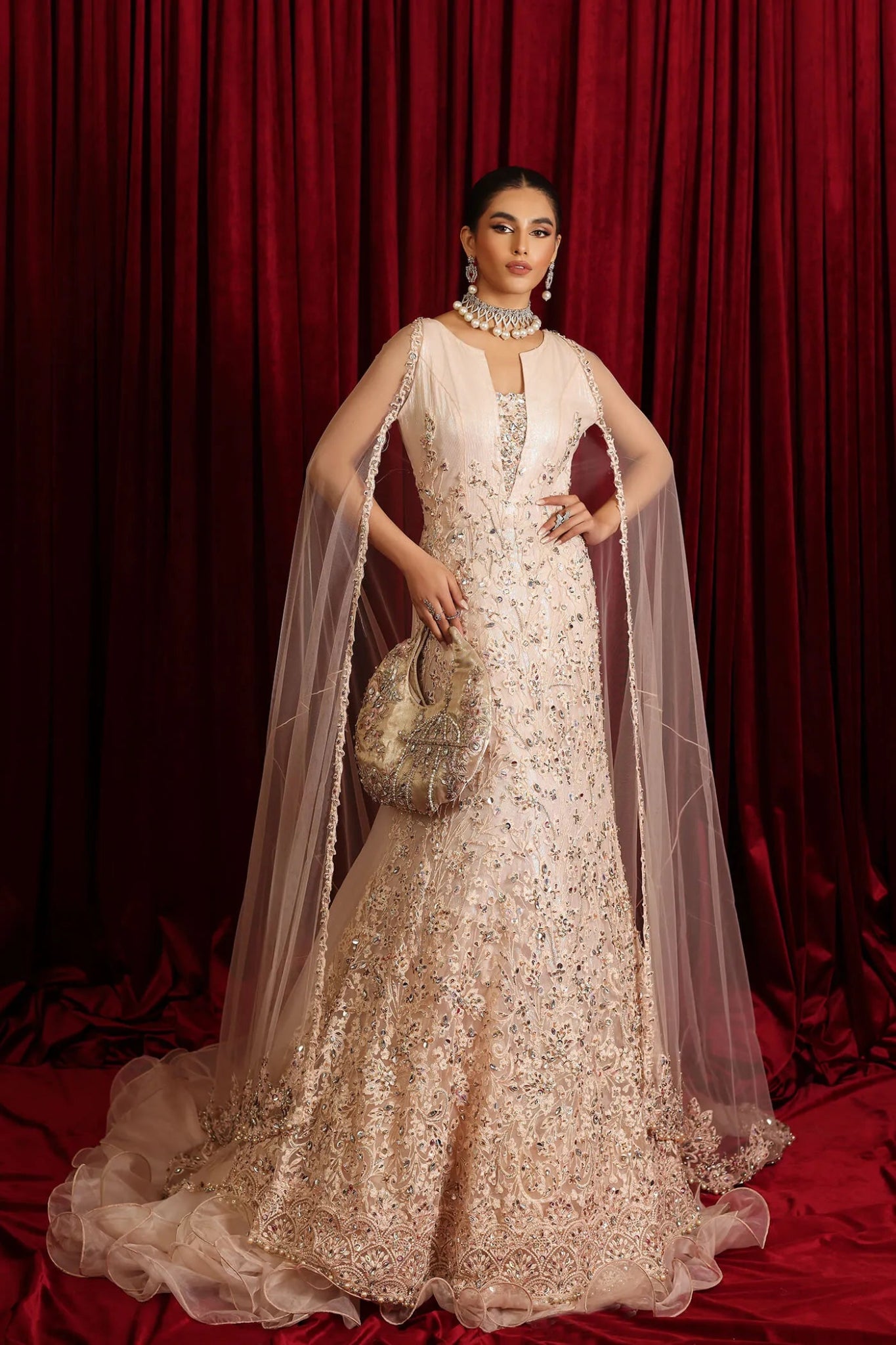 Model in Musferah Saad Starlit Queen, a Pakistani bridal gown in UK.