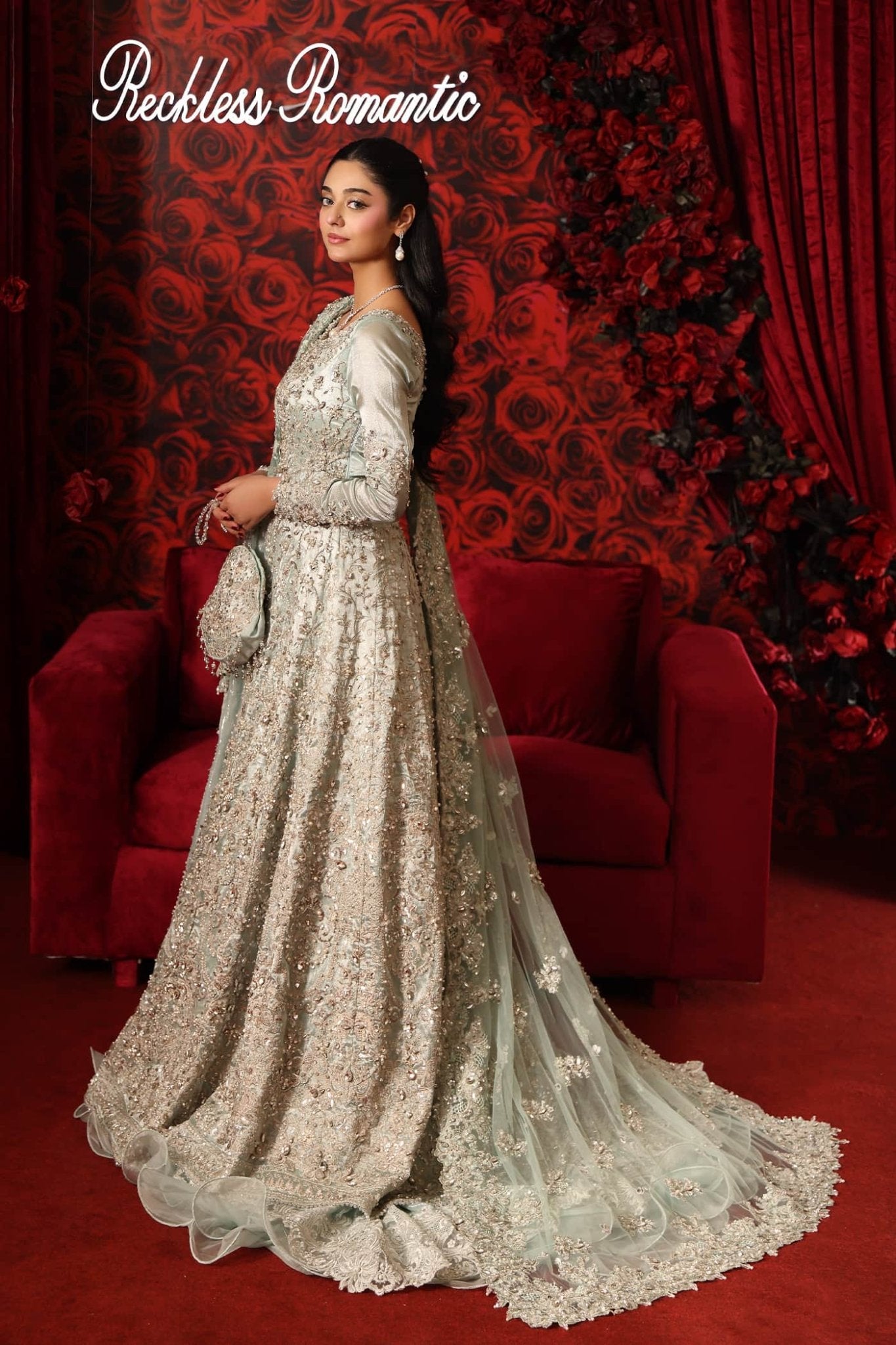 Model wearing Aqua Goddess from Musferah Saad's Reckless Romantic collection in a vibrant aqua shade. Pakistani clothes online in UK at Signature Labels.