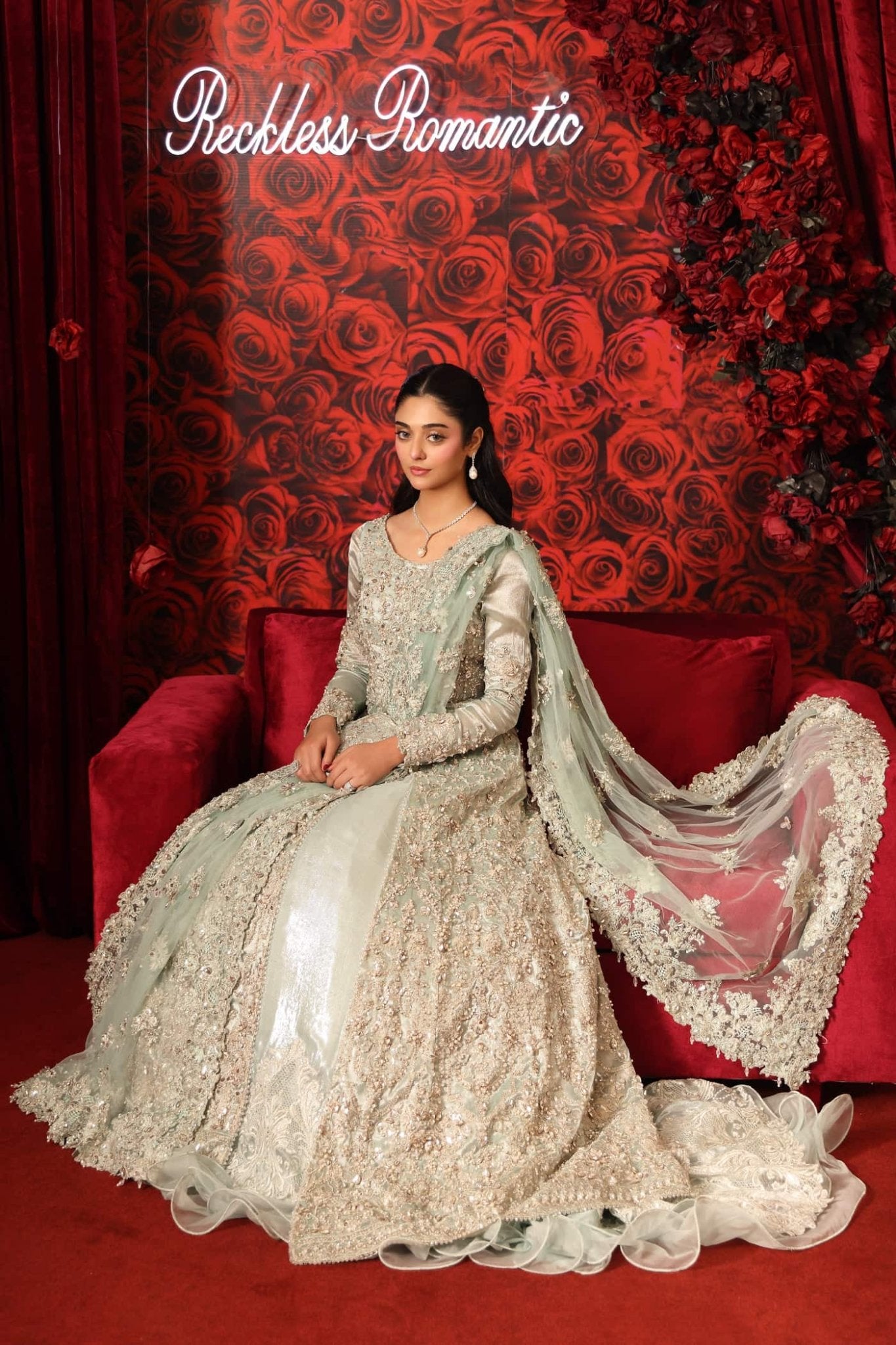 Model wearing Aqua Goddess from Musferah Saad's Reckless Romantic collection in a vibrant aqua shade. Pakistani clothes online in UK at Signature Labels.