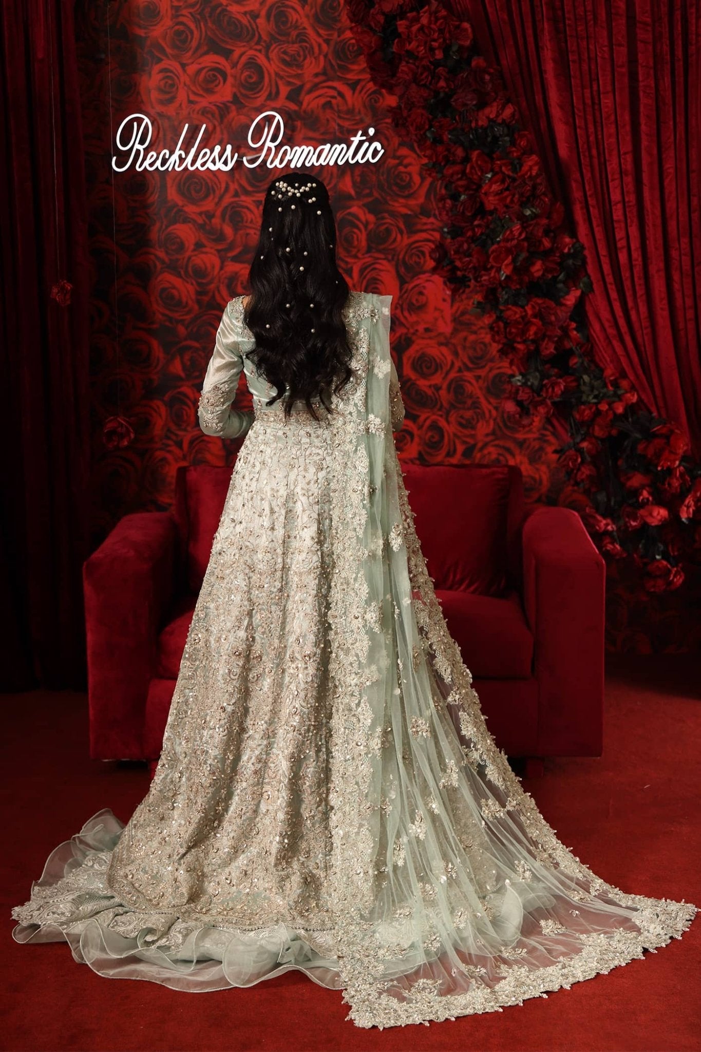 Model wearing Aqua Goddess from Musferah Saad's Reckless Romantic collection in a vibrant aqua shade. Pakistani clothes online in UK at Signature Labels.