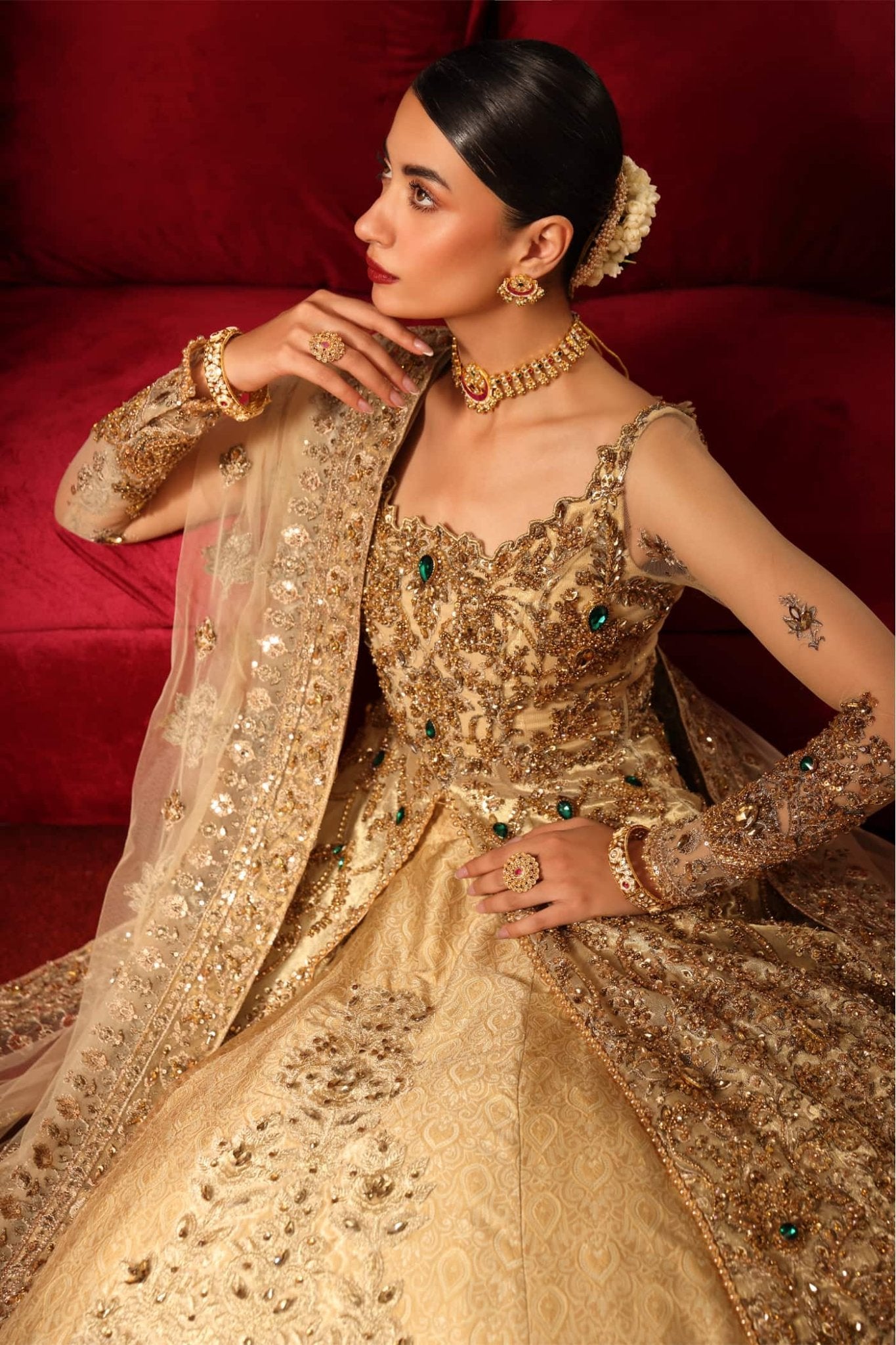 Model wearing Radiant Romance from Musferah Saad's Reckless Romantic collection in a stunning red hue. Pakistani clothes online in UK at Signature Labels.
