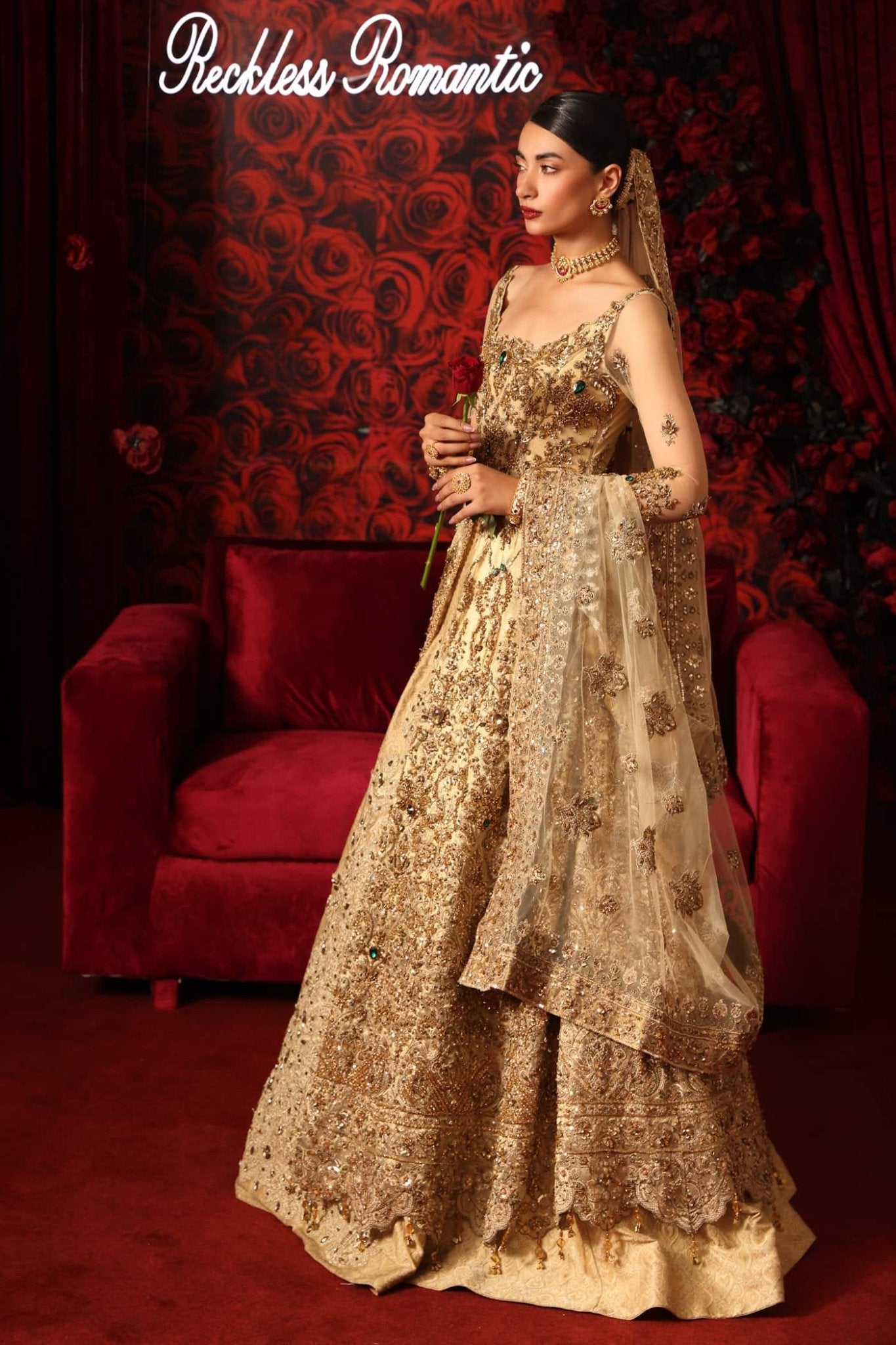 Model wearing Radiant Romance from Musferah Saad's Reckless Romantic collection in a stunning red hue. Pakistani clothes online in UK at Signature Labels.