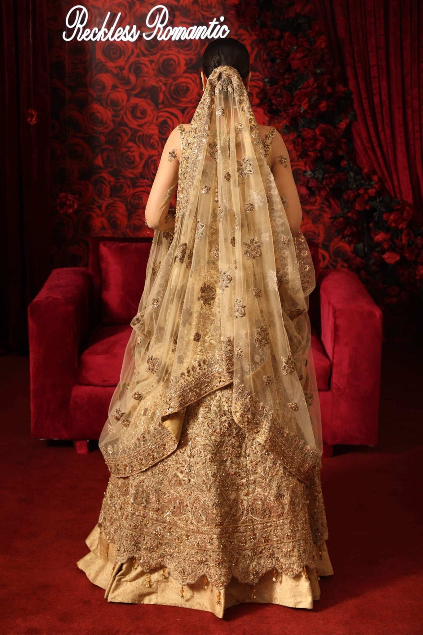 Model wearing Radiant Romance from Musferah Saad's Reckless Romantic collection in a stunning red hue. Pakistani clothes online in UK at Signature Labels.