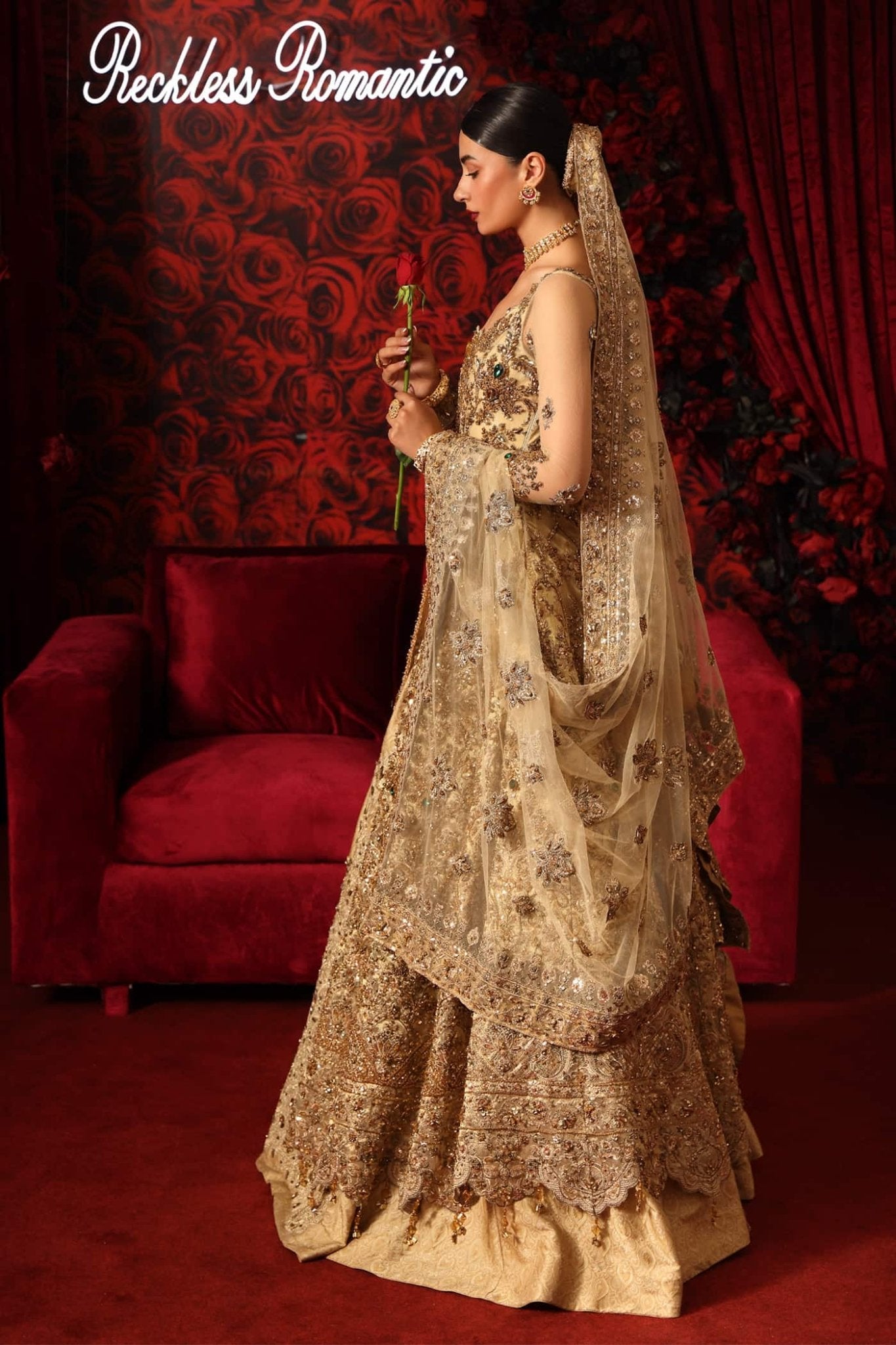 Model wearing Radiant Romance from Musferah Saad's Reckless Romantic collection in a stunning red hue. Pakistani clothes online in UK at Signature Labels.