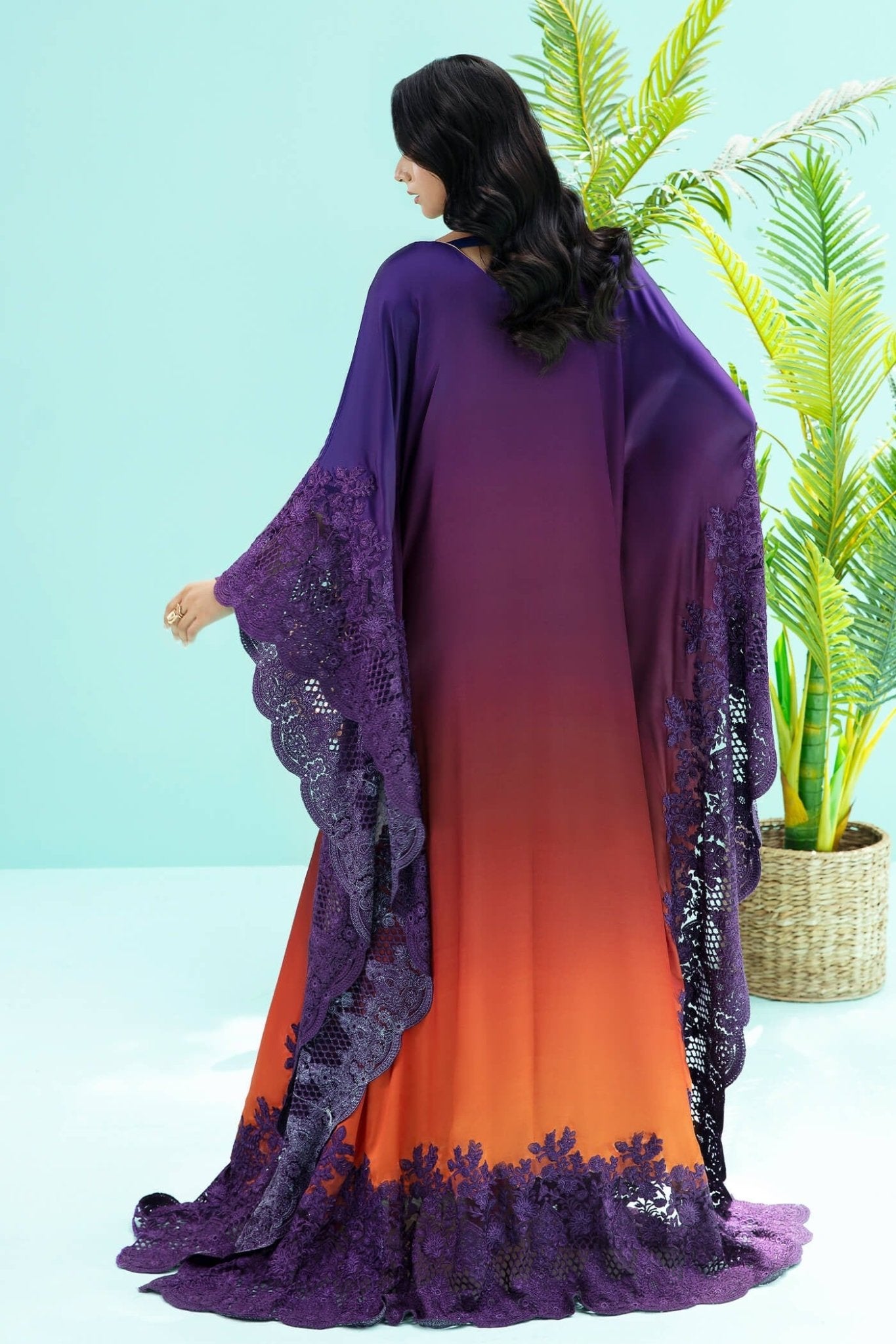 Model wearing purple and rust OMBRE ELEGANCE dress from Musferah Saad's Resort collection '24, showcasing Pakistani clothes online in the UK.