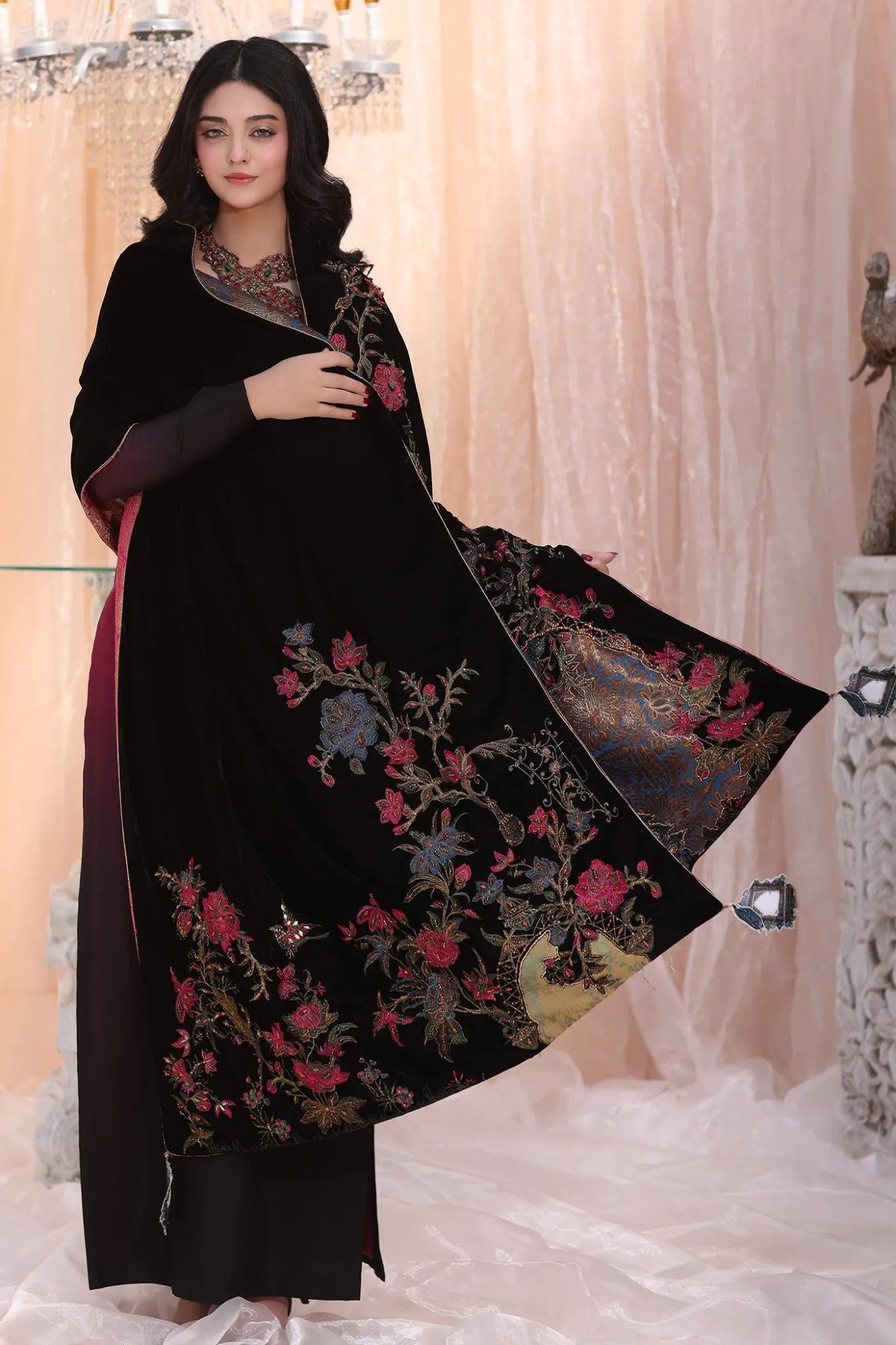 Model wearing Divine Fauna from Musferah Saad's The Serenade collection, featuring floral patterns. Pakistani clothes online in UK at Signature Labels.