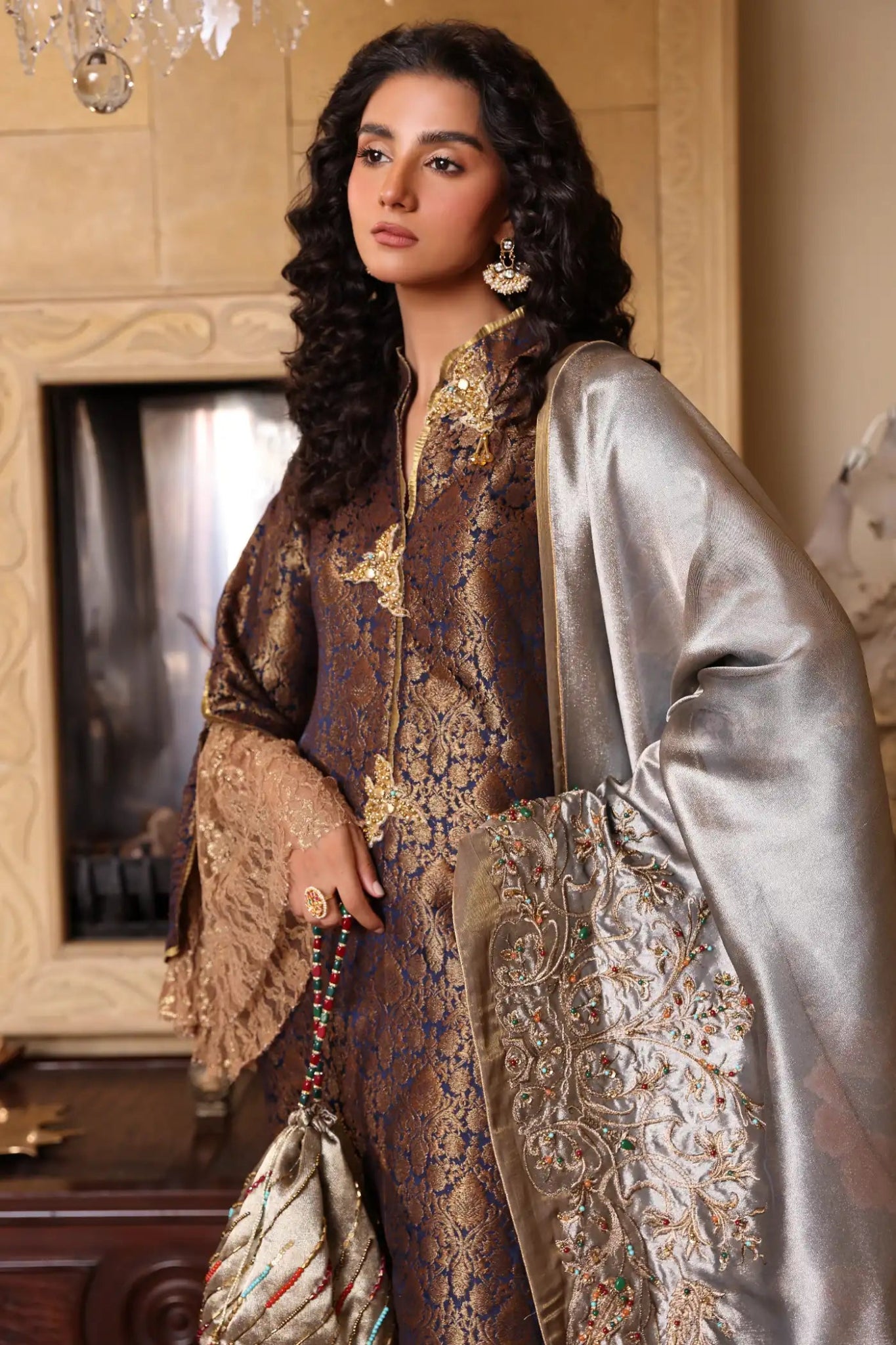 Model wearing Enchantress from Musferah Saad's The Serenade collection in vibrant red, perfect for weddings. Pakistani clothes online in UK at Signature Labels.