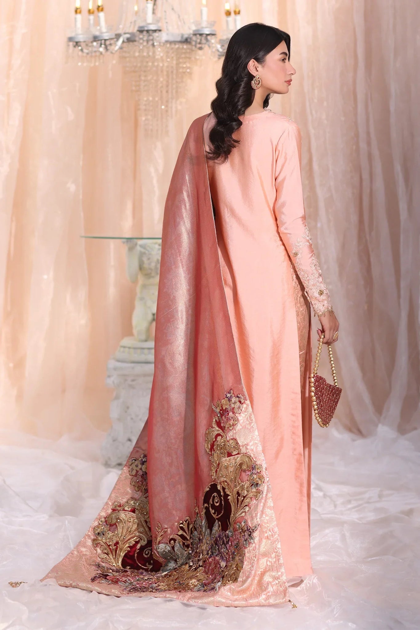 Model wearing Irish Rose from Musferah Saad's The Serenade collection in soft pink tones, ideal for weddings. Pakistani clothes online in UK at Signature Labels.