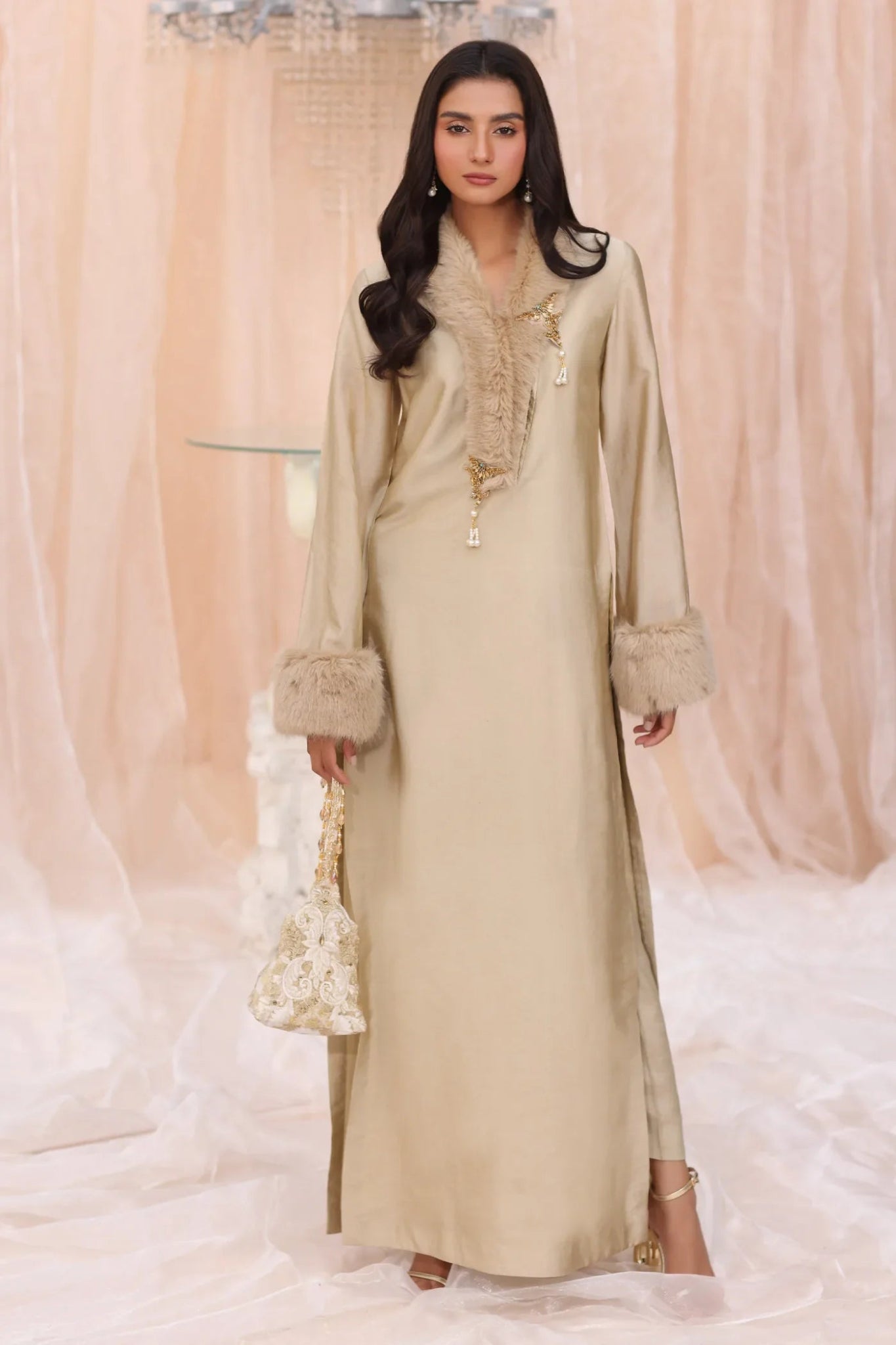 Model wearing The Duchess from Musferah Saad's The Serenade collection in elegant cream, perfect for weddings. Pakistani clothes online in UK at Signature Labels.