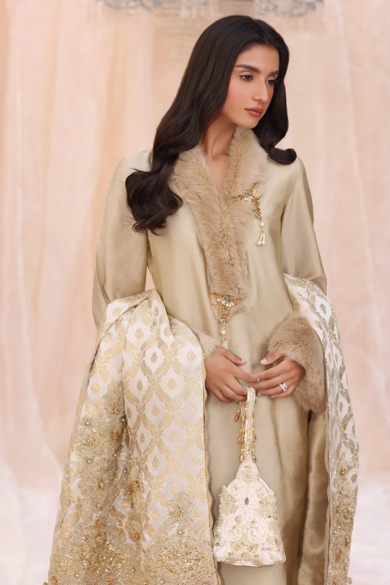 Model wearing The Duchess from Musferah Saad's The Serenade collection in elegant cream, perfect for weddings. Pakistani clothes online in UK at Signature Labels.