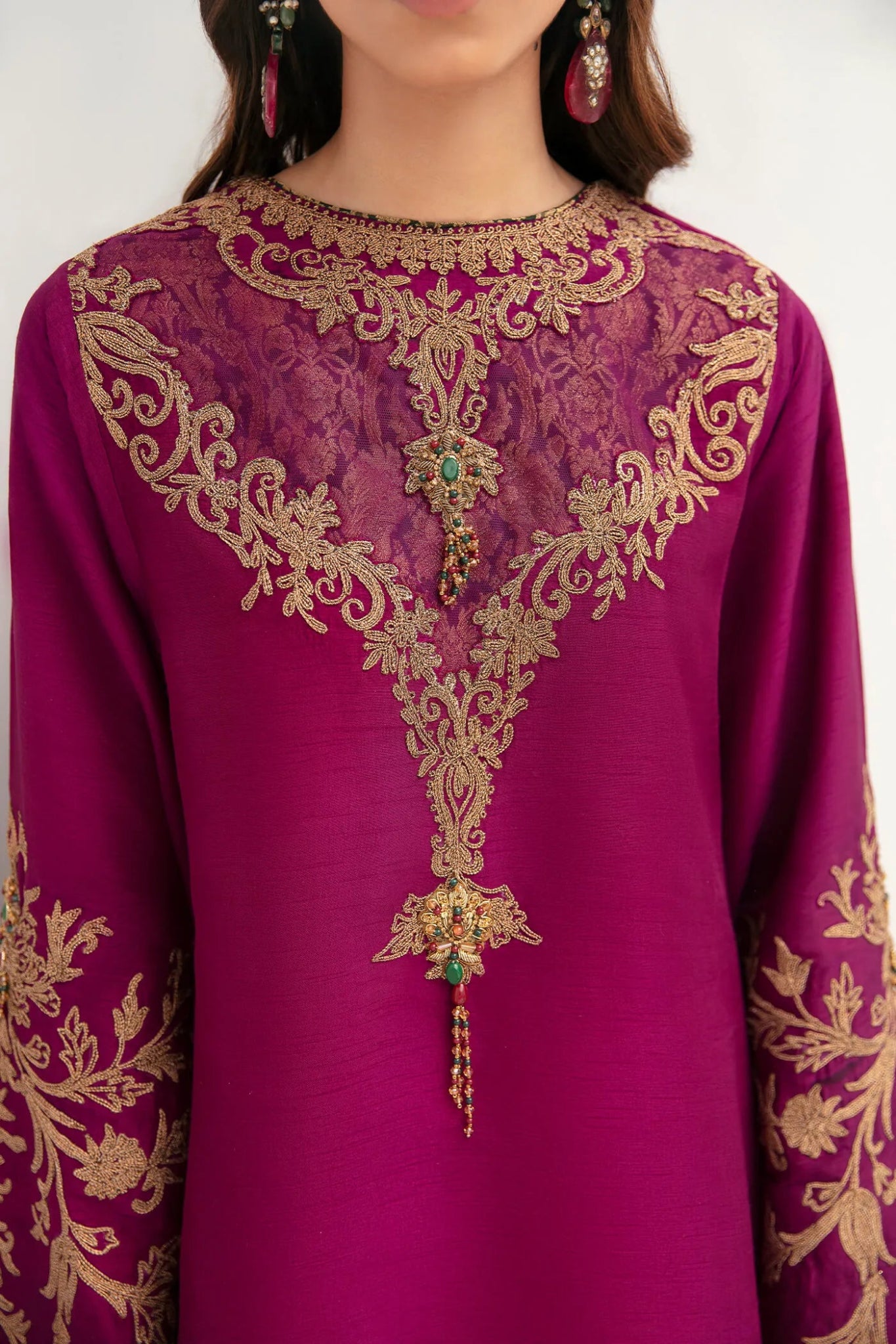 Model wearing a rich mauve MAUVE PASSION dress from Musferah Saad's VIVA LA VIDA collection, showcasing Pakistani clothes online in the UK.