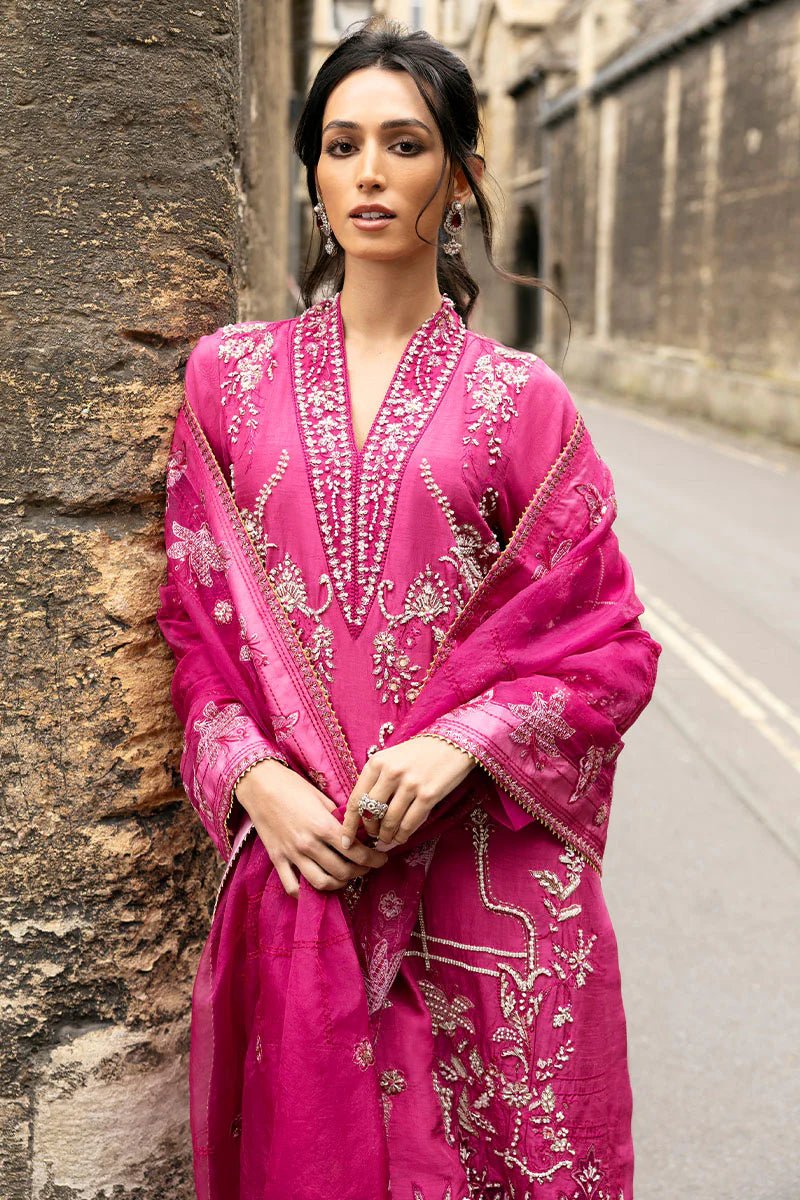 Model wearing a bright pink Oxford Whisper dress from Mushq, part of Celestine The Oxford Edit 24. Perfect Pakistani wedding clothes.