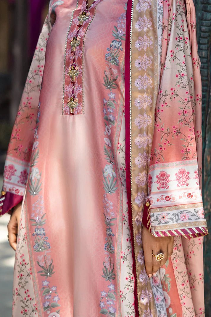 Model wearing Roseate dress from Mushq's Nirvana Silk Edit in soft pink with intricate floral designs. Pakistani winter casual pret clothes available online in the UK.