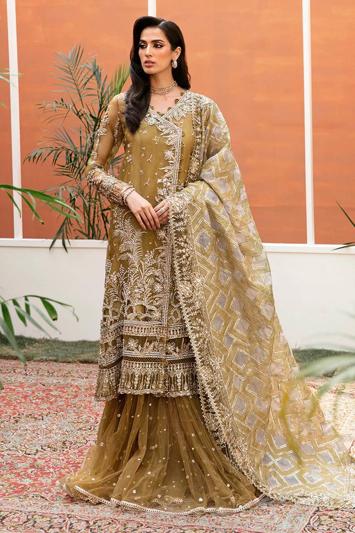 Model wearing Bosco dress from Mushq's Tuscany Luxury Formals. Pakistani clothes online in the UK at Signature Labels.